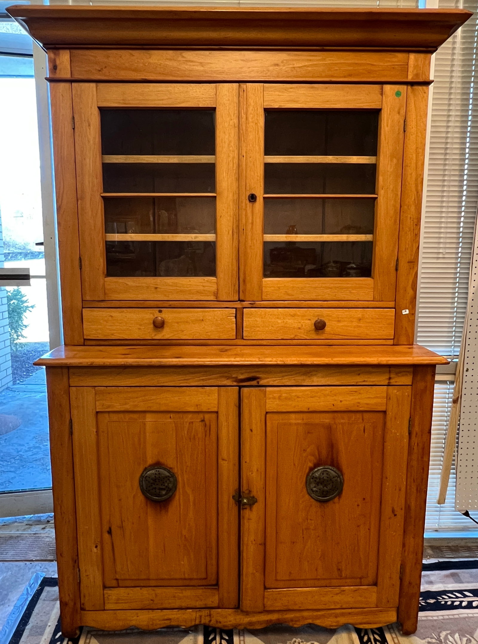 Early Ozaukee Co. Wisconsin Pine Step Back Cupboard c.1820/30's: An early Ozaukee Step back Cupboard, made by a carpenter in Ozaukee county in between Freistadt and Germantown. This wonderful step back preserving cupboard c.1830/40's features double door base with 