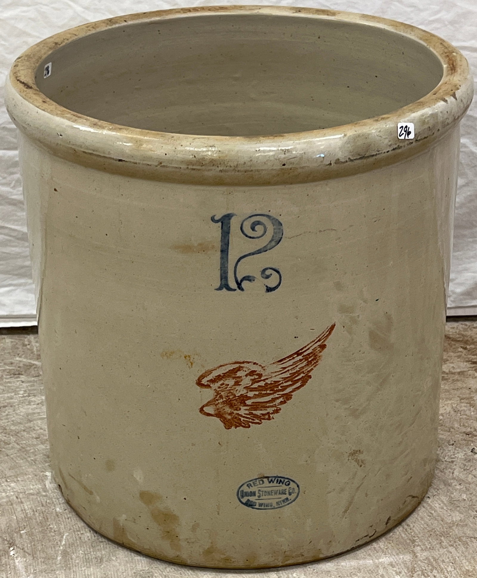 Red Wing 12 Gallon Stoneware Crock c.1900: An antique Red Wing 12 gallon crock in very good condition that features the Red Wing symbol and the Union Stoneware company logo manufactured in Minnesota between 1900-1915 in very good condition. It