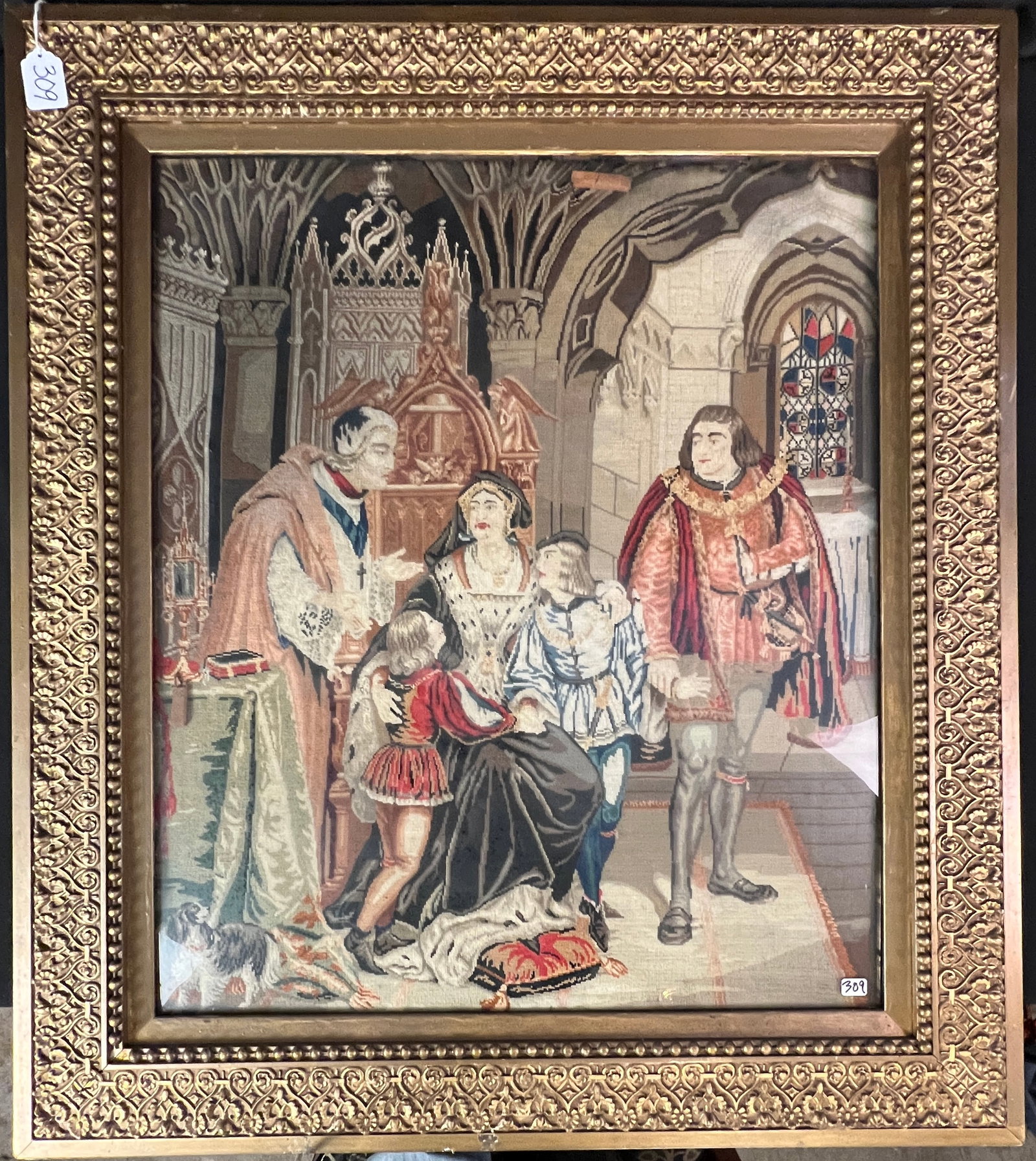 French Needlepoint Tapestry, c.1860s: A 19th century French needlepoint tapestry depicting scene featuring a noble familial gathering in a gothic setting. It is entirely hand embroidered in needlepoint with wool and silk. The tapestry is