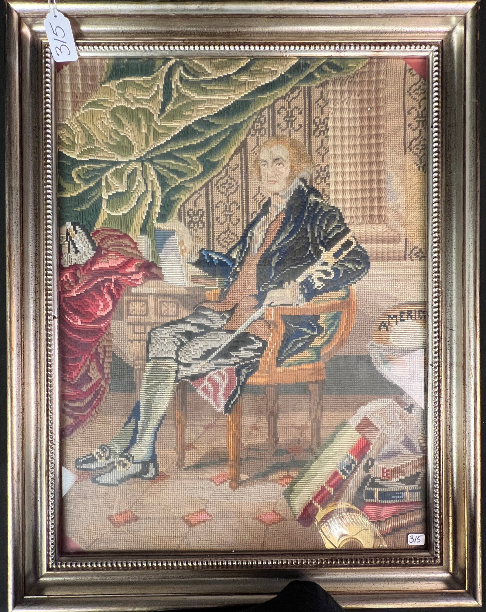 Needlepoint Tapestry of George Washington: A needlepoint tapestry done by the Sisters of Notre Dame Convent of George Washington in his library. Portraits like this were often executed based on patterns from German wool work sets. The