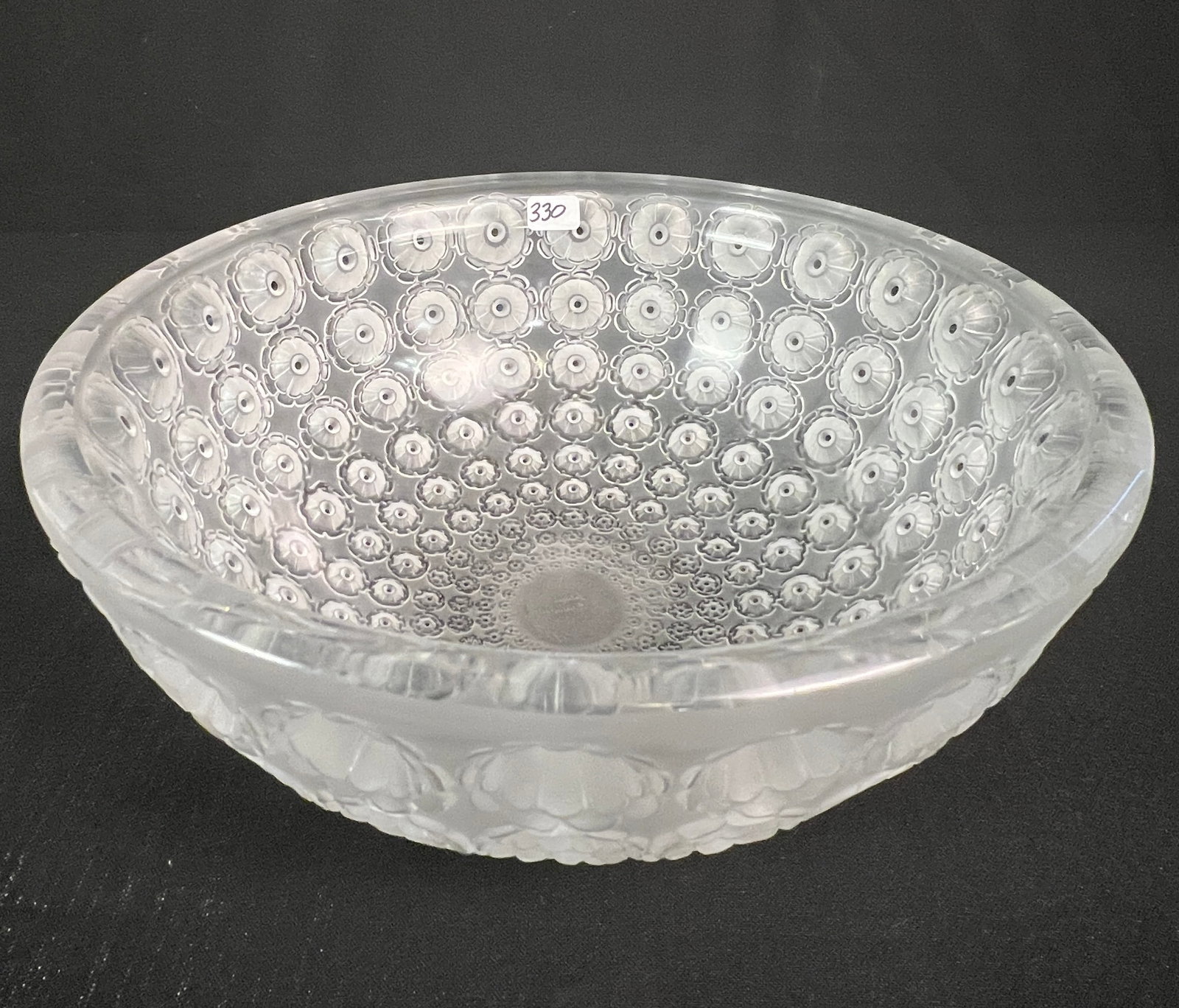 Lalique "Nemours" Bowl c.1929: A large size Lalique "Nemours" crystal bowl c.1929, signed Lalique France on the bottom that features a satin relief of Nemours cactus flowers with blue enamel centers in excellent condition. It measu