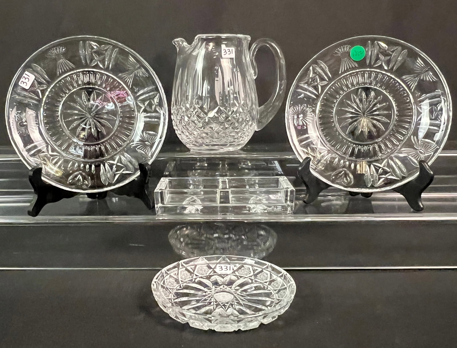 Waterford Crystal Pitcher, Dishes and Divided Tray: A group of Waterford Crystal to include a "Lismore" ice lip pitcher, a Waterford John Rocha divided pin tray, 2 Waterford "Millennium" luncheon plates and an unmarked crystal dish.