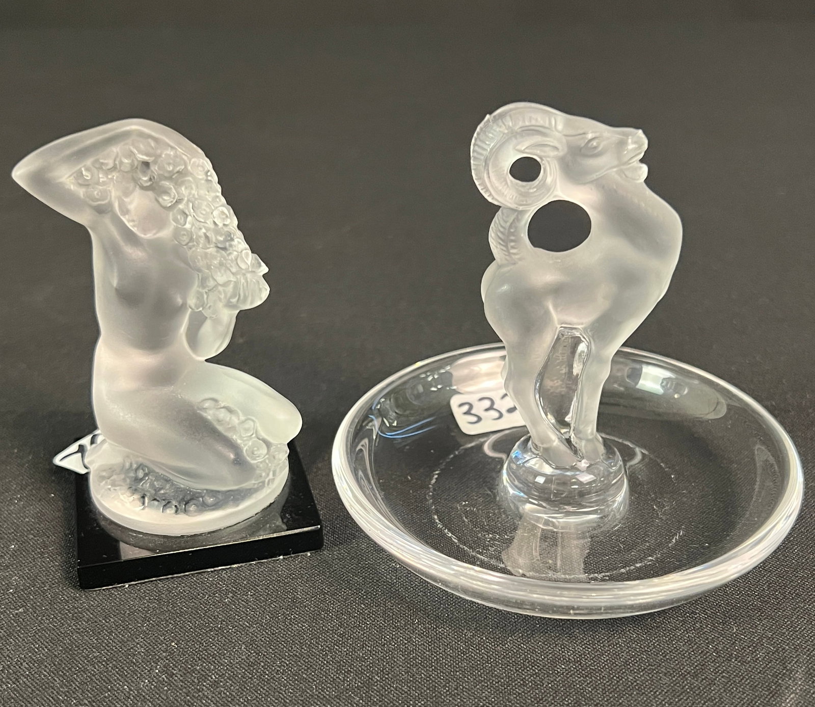 Lalique "Floreal" Statuette and "Ram" Ring Dish: A Lalique "Floreal" statuette on an onyx base and a Lalique "Ram" ring or trinket dish.