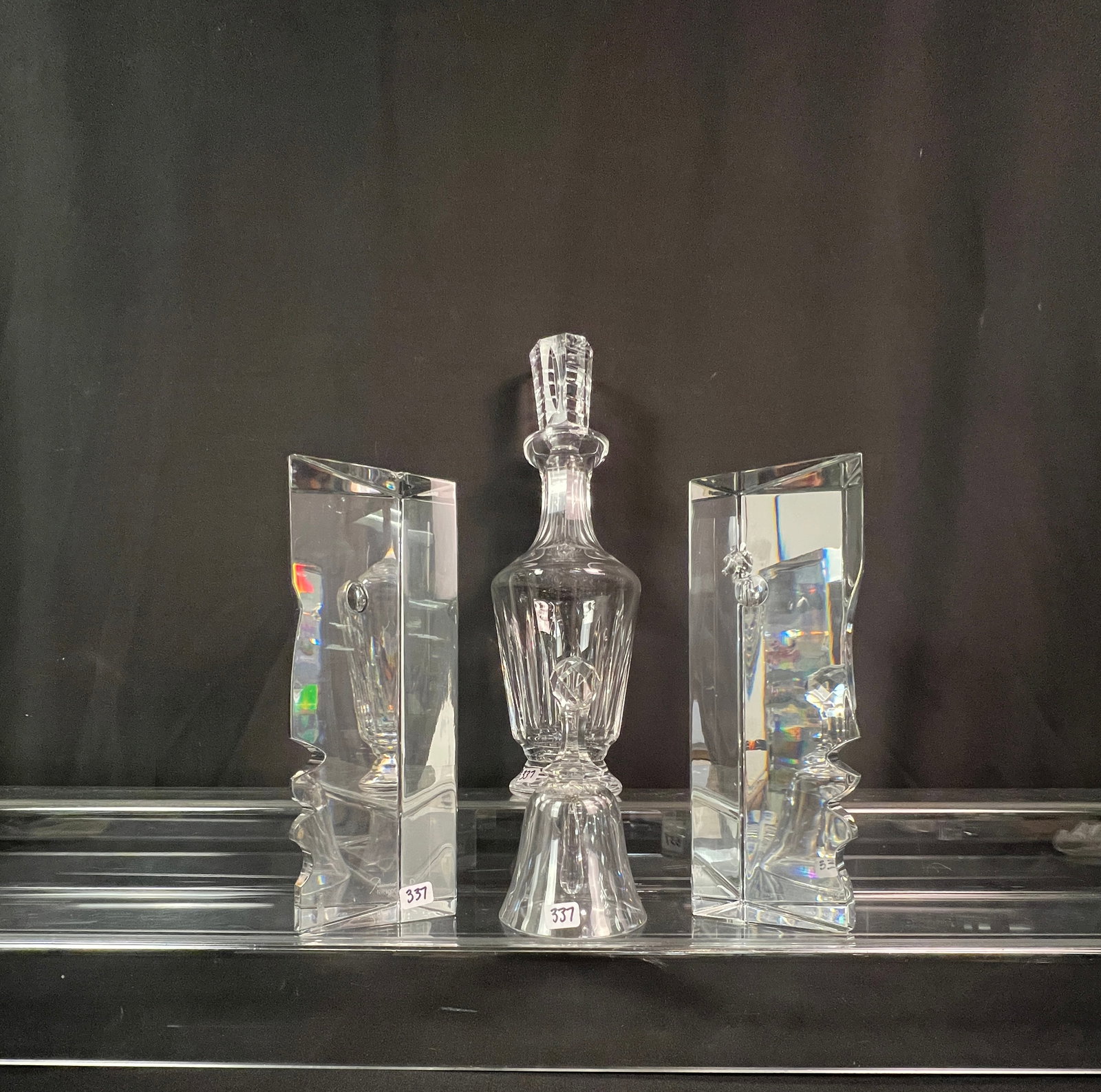2 Baccarat Crystal Face Sculptures, Bell, More!: A group of high quality cut crystal to include two Baccarat Crystal matching Modernist face sculptures designed by Robert Rigo that measure 10.5" tall X 4.5" across X 3"deep (one has a chip on the top
