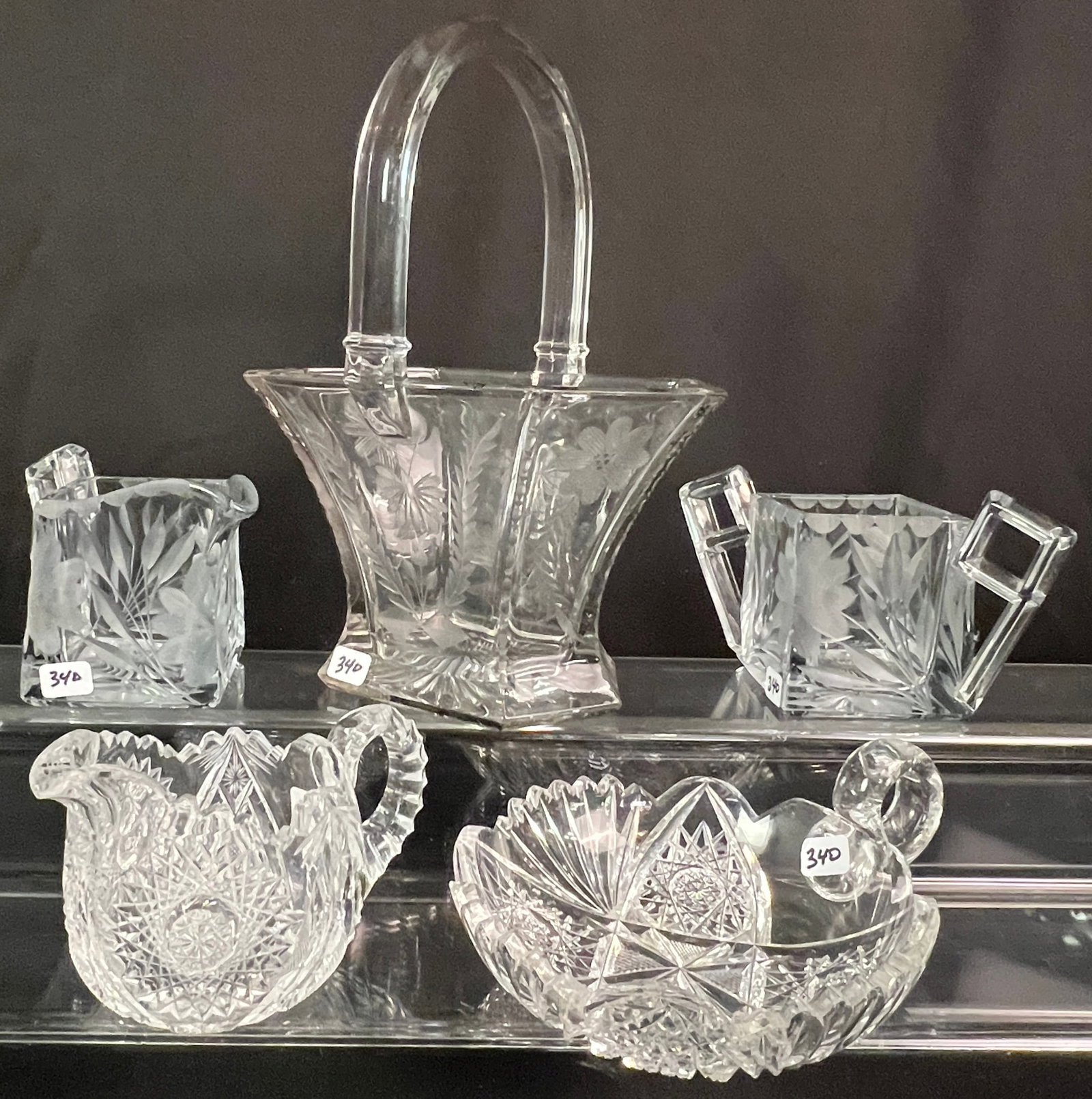 Heisey Glass and Cut Crystal: A group of antique glass to include an 8" Heisey Glass Plain Hexagon basket with wheel cut ferns flowers and insects, a pair of Heisey wheel cut floral sugar and creamer in the "Quator" pattern, an Am