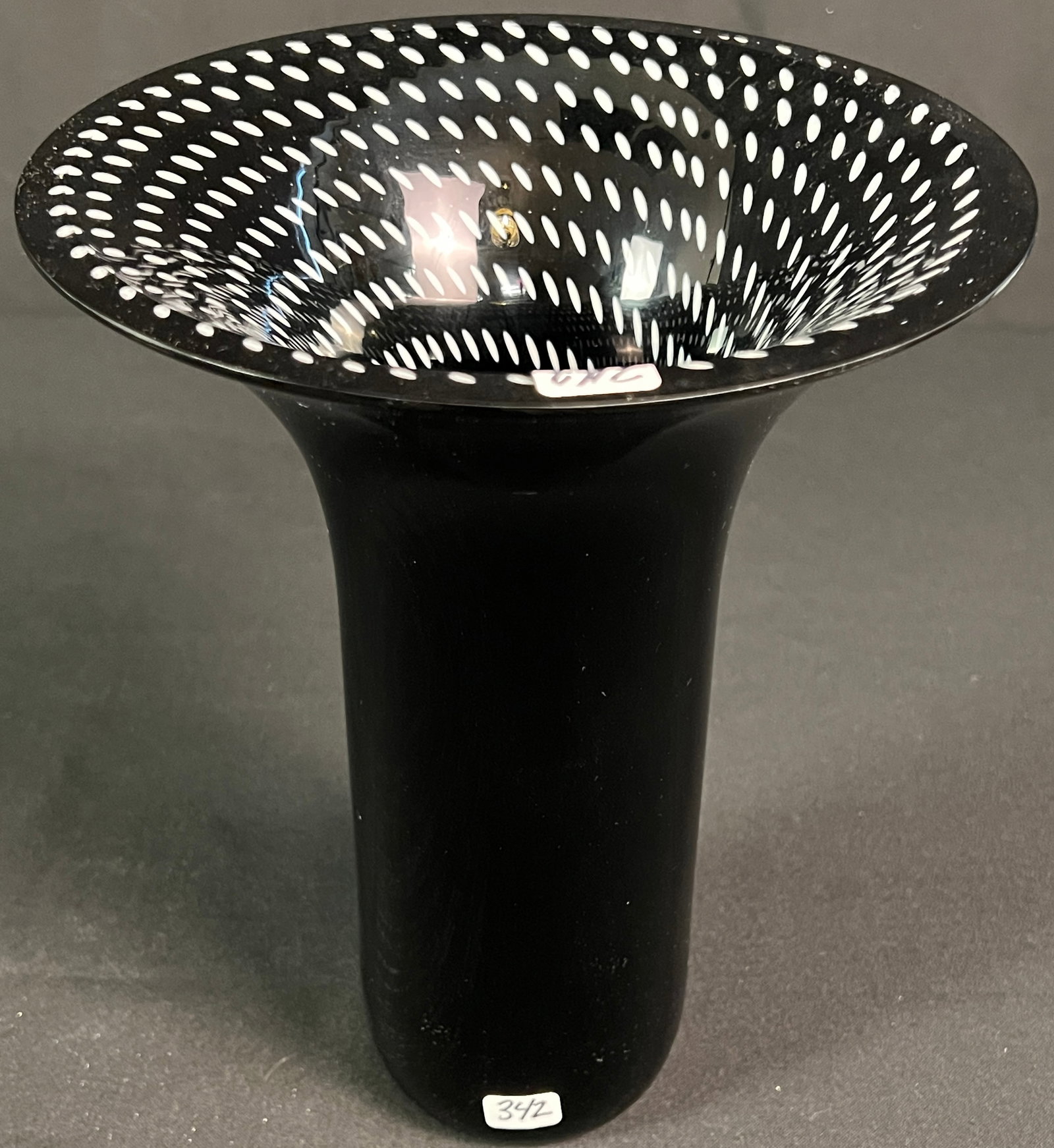 Rosenthal Studio Linie vase, Signed c.1979: A Modernist black art glass vase with pop art descending dots interior swirl is by Rosenthal Studio Linie c.1979 in excellent condition. It is signed on the bottom It measures 10" tall X 8" across.