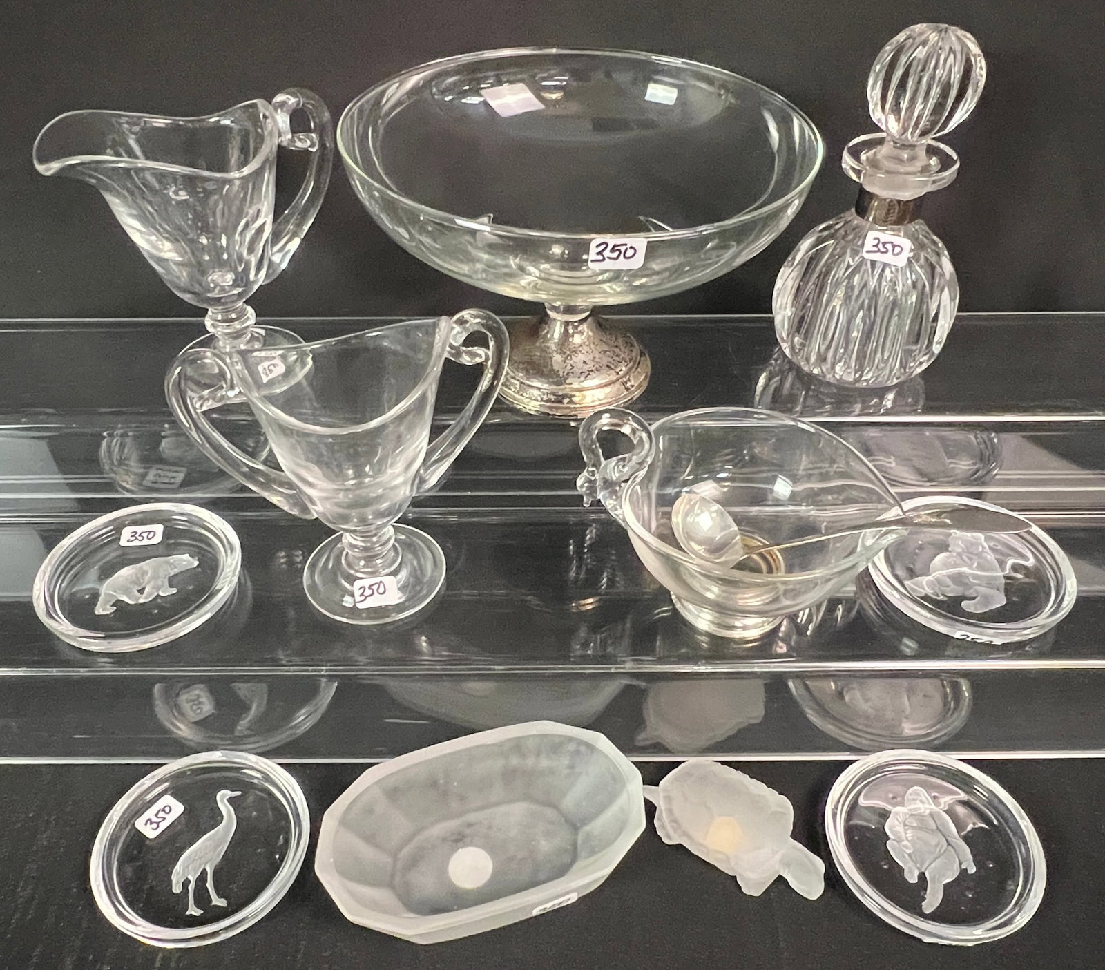 Designer Crystal Furnishings, More!: A group of quality glass and crystal furnishings to include a vintage weighted sterling silver footed bowl (5" tall X 7.5" across), a 6.5" tall reeded perfume bottle with silver collar and round reede