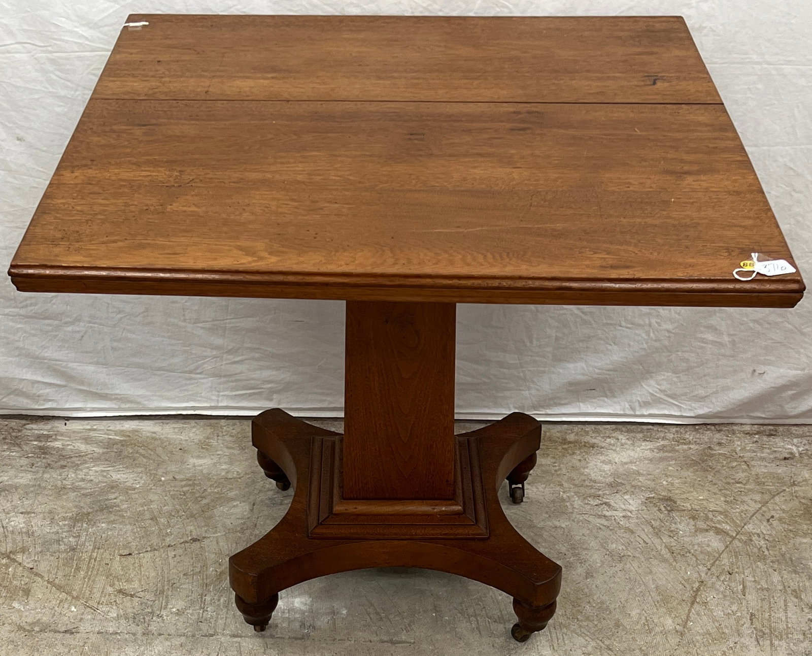 Square Mahogany Tea Table: A turn of the century square mahogany tea table in original finish. In good condition and measures 29" tall X 33" square.