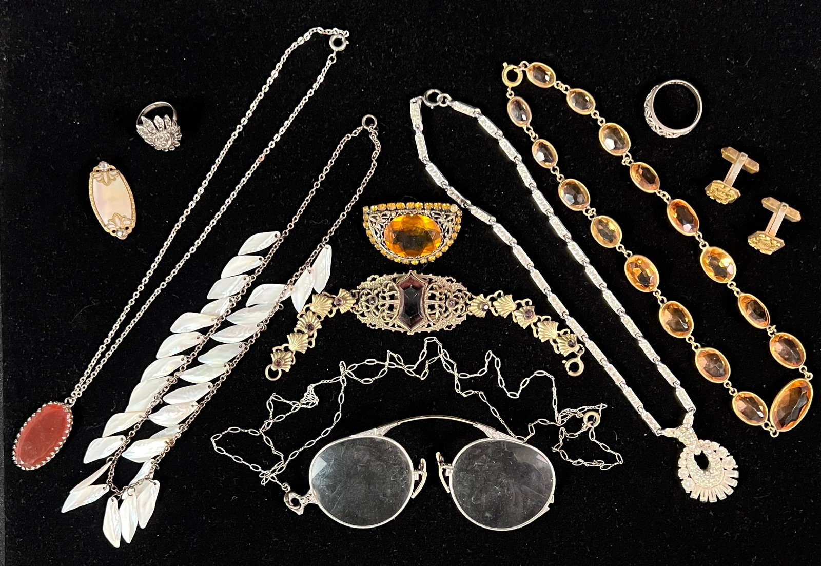 Group of Antique Costume Jewelry and More: A group of antique jewelry to include two sterling Art Deco marcasite rings, a Victorian purple glass and filagree bracelet, a 1920s citrine glass necklace, a citrine glass brooch, a pair of gold fill