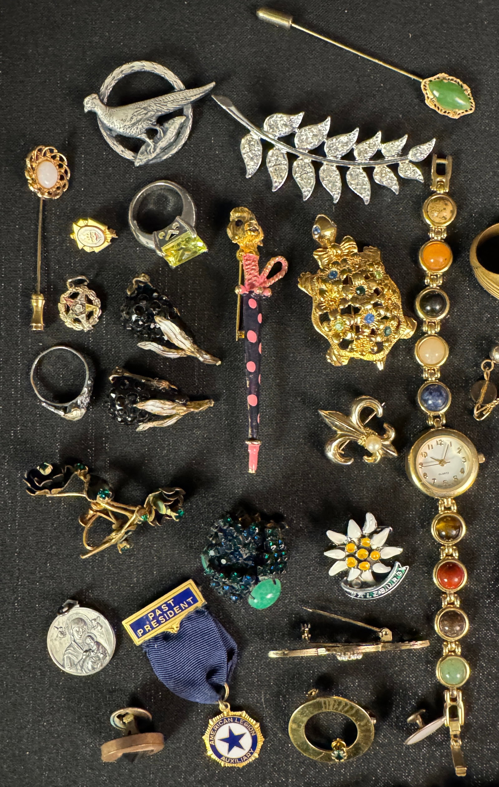 Vintage Costume Jewelry Earrings, Pins and More: A group of vintage costume jewelry to include gold tone jewelry, Czech Crystal, Earrings, Brooches and more.