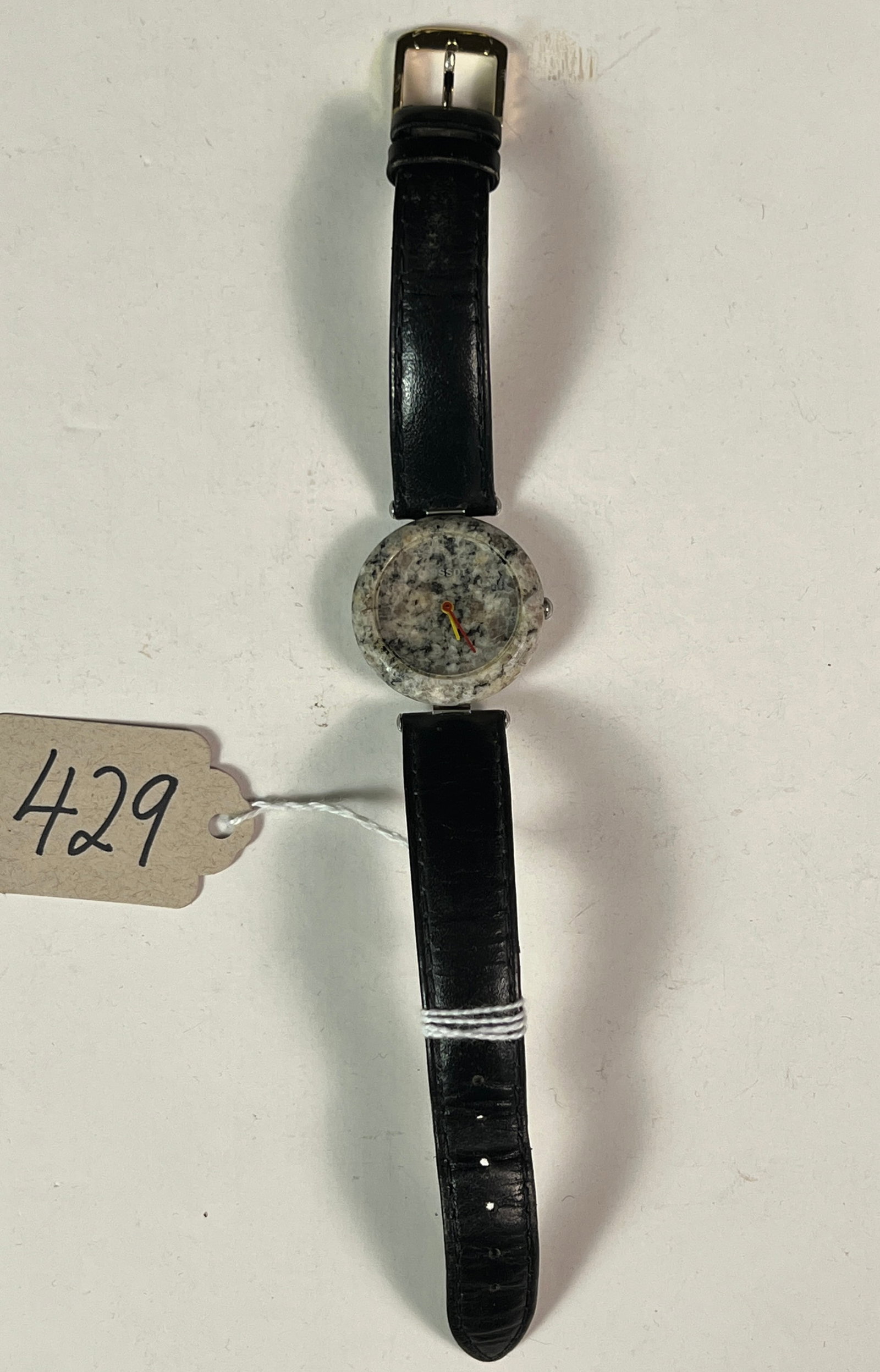 Tissot Ladies Wrist Watch: A genuine Tissot RockWatch featuring a granite case and quartz movement. Battery needed but in otherwise good condition.
