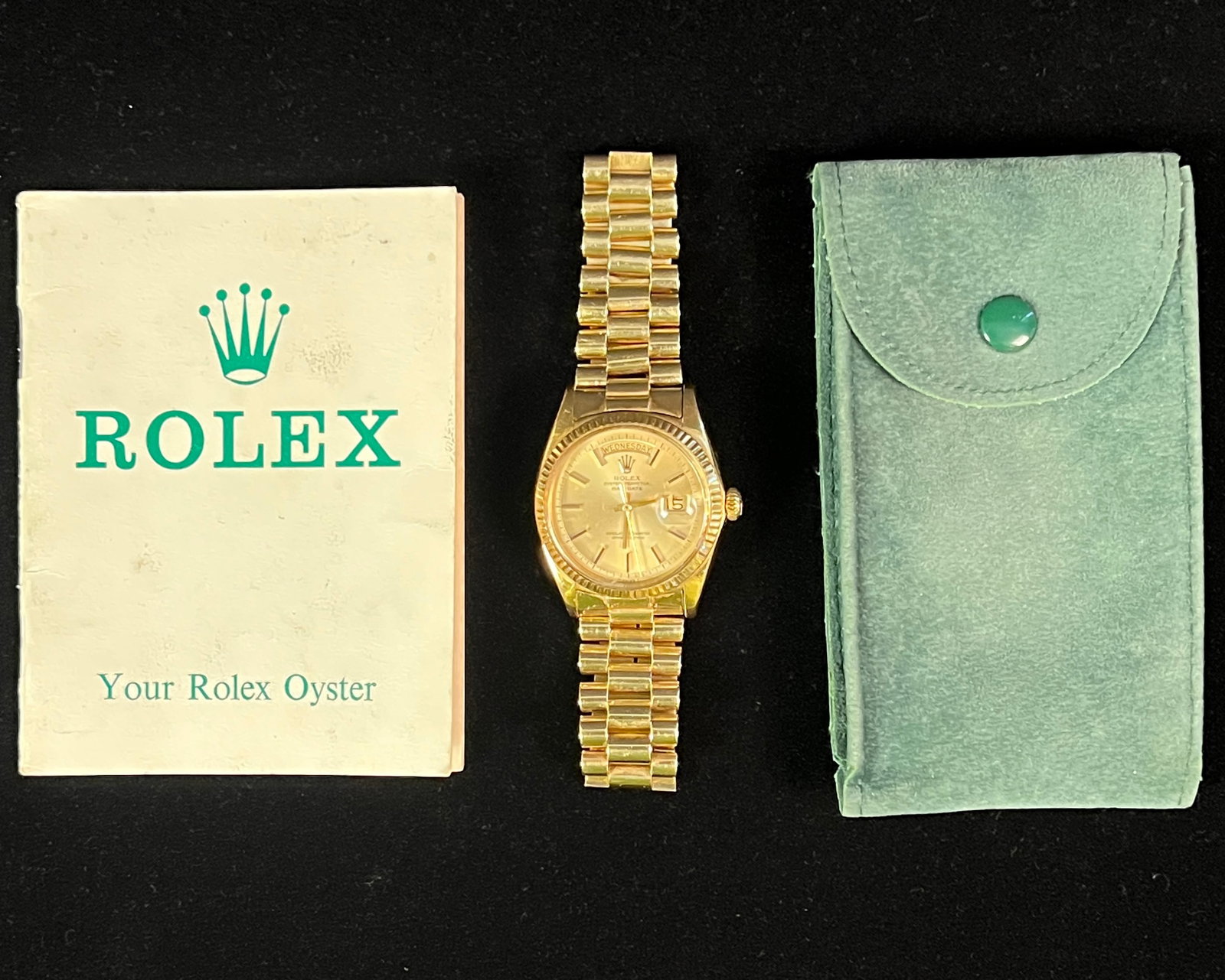 Rolex Oyster 18K Men's Watch, c.1970: A stand out vintage Rolex Oyster day-date president men's watch, model number 1806, featuring a 36mm solid 18K yellow gold case and a matching yellow gold "Presidential" bracelet, c.1970. Watch comes
