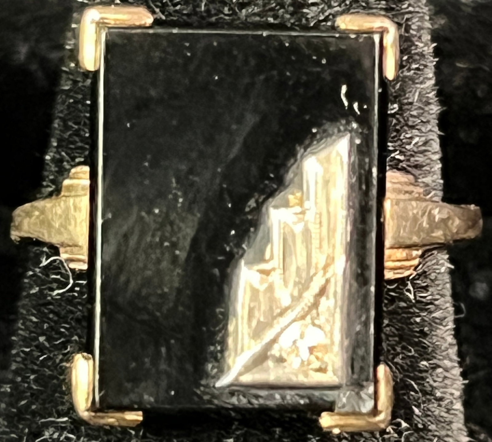 10K Onyx and Diamond Women's Art Deco Ring: A 10k onyx and diamond women's Art Deco ring, featuring a rectangular onyx with stylized Art Deco applied accent featuring a single cut diamond. The inside of the ring has the engraved initials of