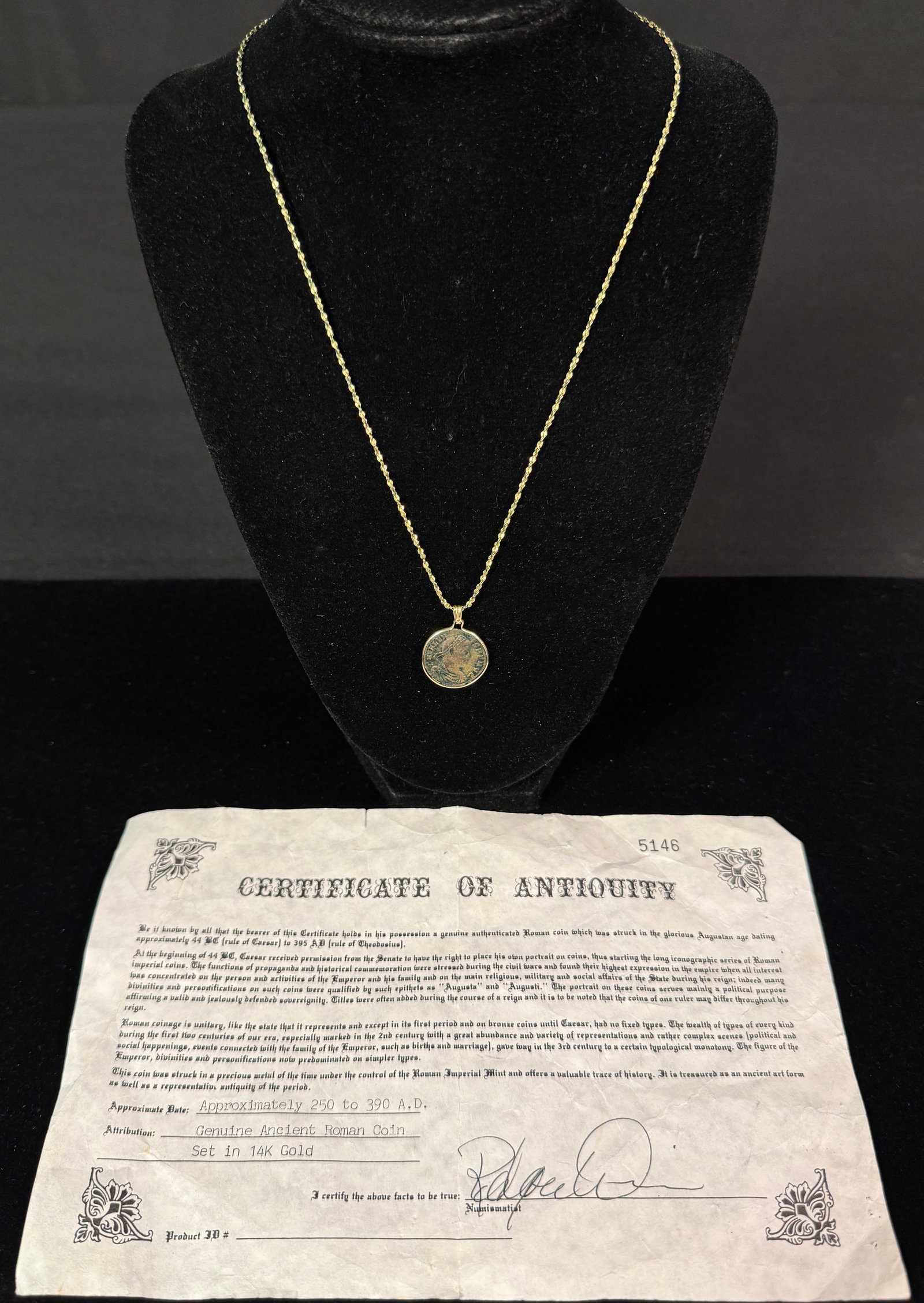 Ancient Roman Coin Necklace in 14k Setting: An ancient roman coin dating to 250 - 390 A.D. set in a 14K gold pendant setting. The chain is gold filled, necklace comes with a certificate of authenticity describing the piece.