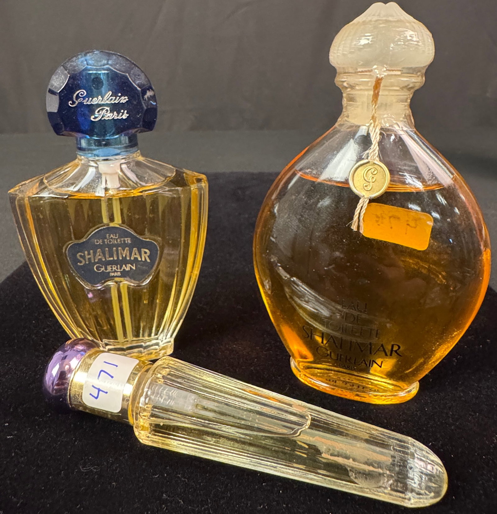 Group of Three Vintage Perfumes: A group of three vintage perfumes to include two Shalimar and one VICTORIA by Victoria's Secret classic perfume.