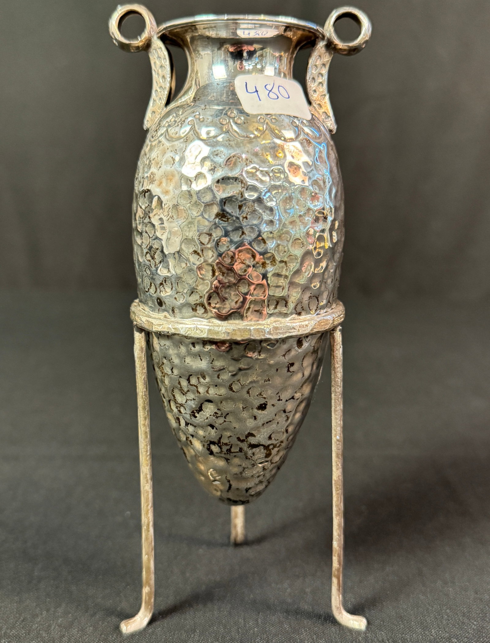 Sterling Hammered Amorphic Vase on Stand: A sterling hammered amorphic Grecian vase on three-legged stand. Bottom of vase is marked 925 and has a total weight of 121grams. On stand it measures 6.5" tall.