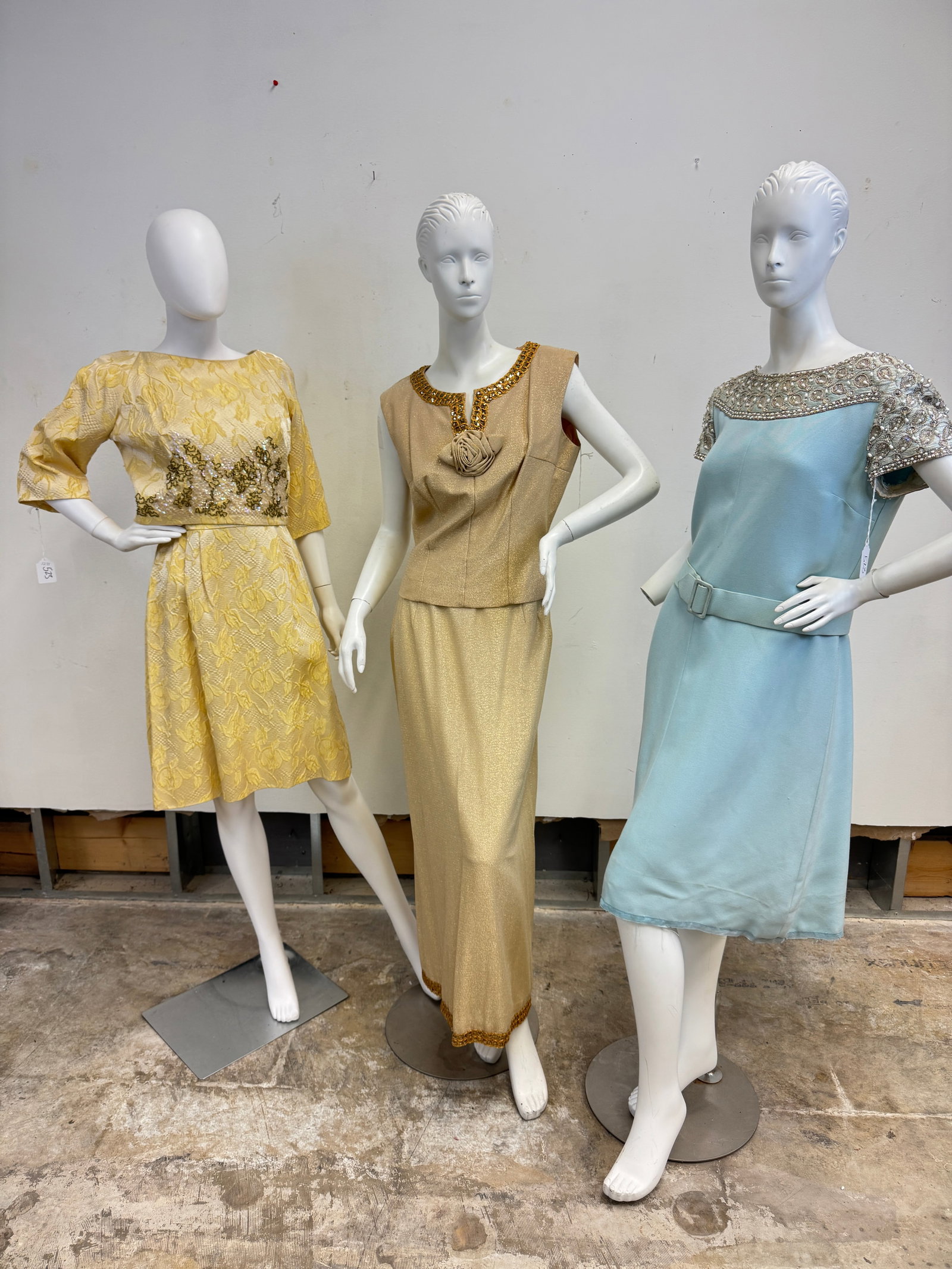 3 Vintage 1960's Cocktail Dresses: 3 Vintage 1960's ladies fancy dresses to include a yellow and gold floral brocade 2 pc dress and matching top that features a sleeveless fitted dress and bolero style beaded jacket that buttons in the