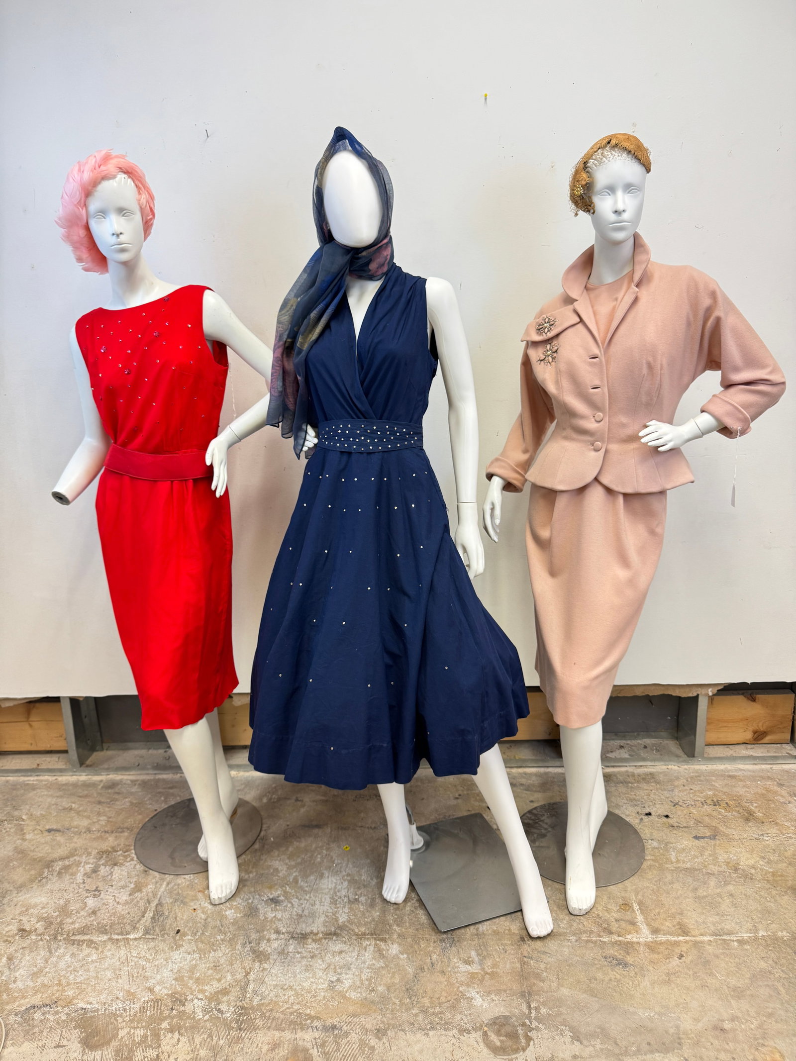 3 1950's Vintage Ladies Dresses: 3 vintage 1950's ladies dresses to include a shell pink wool sleeveless wiggle dress with matching fitted jacket and rhinestone and beaded floral details on jacket and bodice (jacket missing 2 buttons