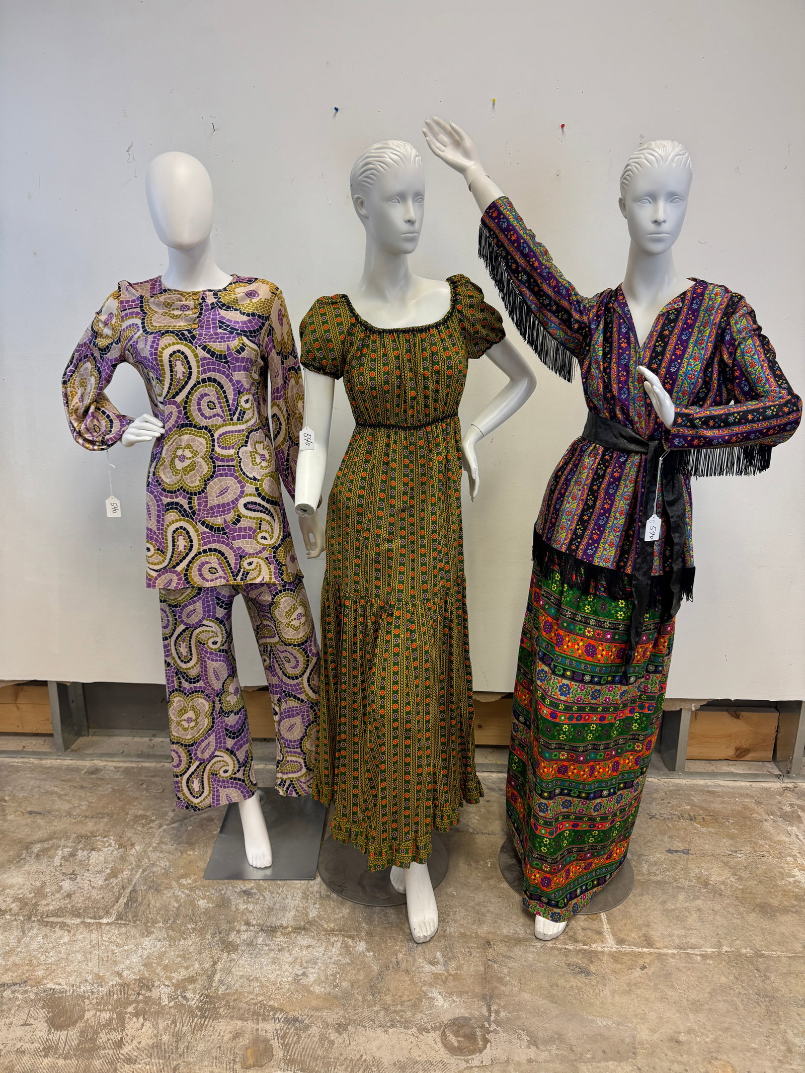 Vintage Psychedelic Ladies Garments c1960's: A group of vintage psychedelic ladies 1960's garments to include a floral and paisley 2 pc purple and olive long sleeve tunic and matching wide leg pants, a purple green , pink and yellow floral strip