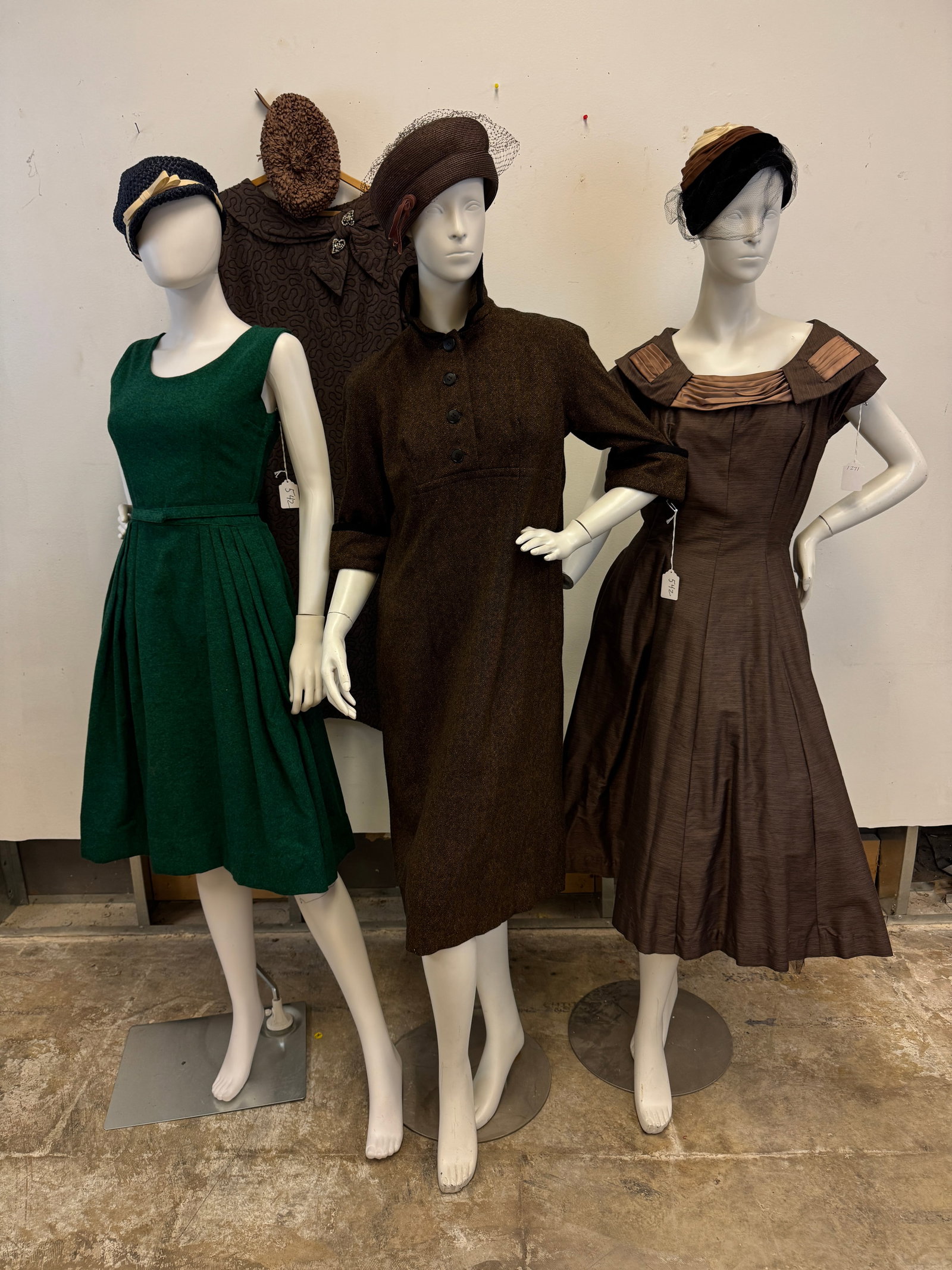 4 Vintage Ladies Fall Dresses c.1950's: A group of 4 quality vintage ladies dresses to include a green sleeveless wool fit and flair dress, a brown wool Kahn of Minneapolis short sleeve dress, a brown Reich fit and flair sleeveless cocktail
