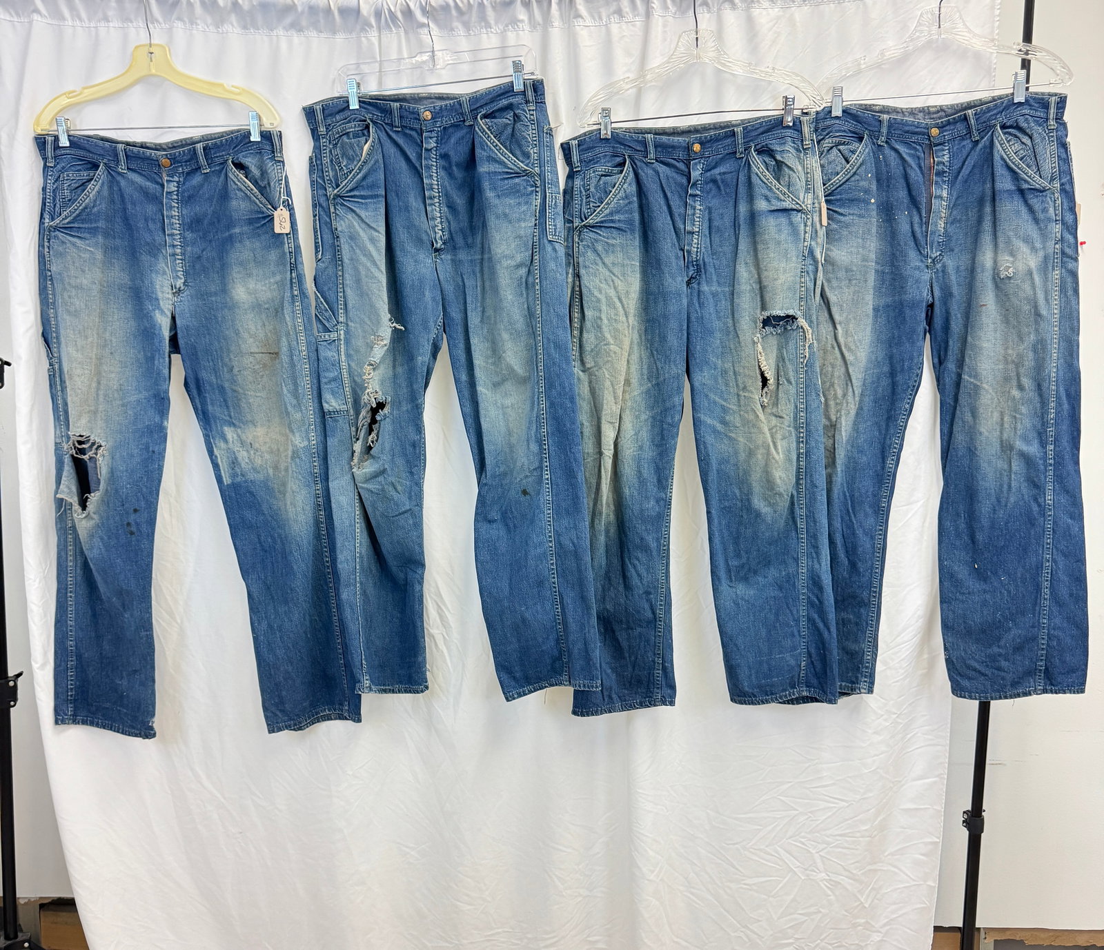 4 Vintage Pairs of Carter's Farm Denim Jeans c.1940's: A group of 4 Carter's Jeans C.1940's all same design profile to include a 40's pair sz 34" waist denim work jeans that feature back patch pockets, watch pockets, side tool pockets. . (tear on left