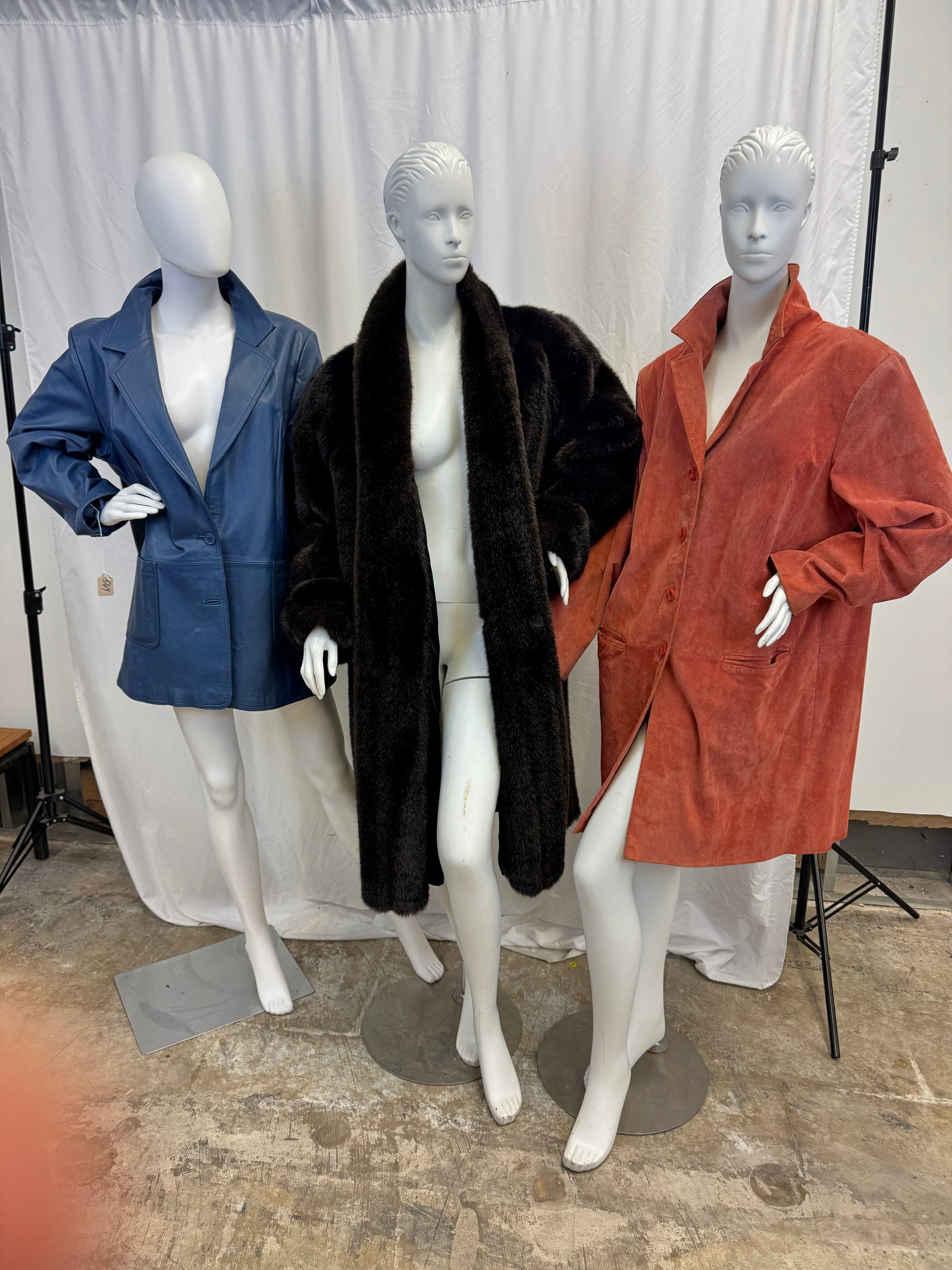 Ladies Vintage Leather Coats, More!: A group of ladies vintage outerwear to include a brown faux fur coat c1980's, a blue leather ladies jacket sz 1X, and a watermelon colored suede coat sz 1X.