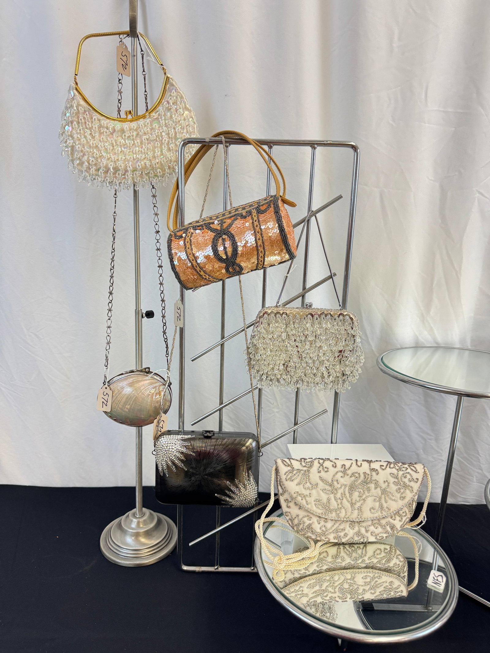 Vintage Group of Ladies Evening Bags c1960-80's: A group of vintage evening bags to include a 1970' s Silver Los Castillio Mother of Pearl evening bag on a silver chain with a polished abalone shell casing and silver frame made in Taxco Mexico in ex