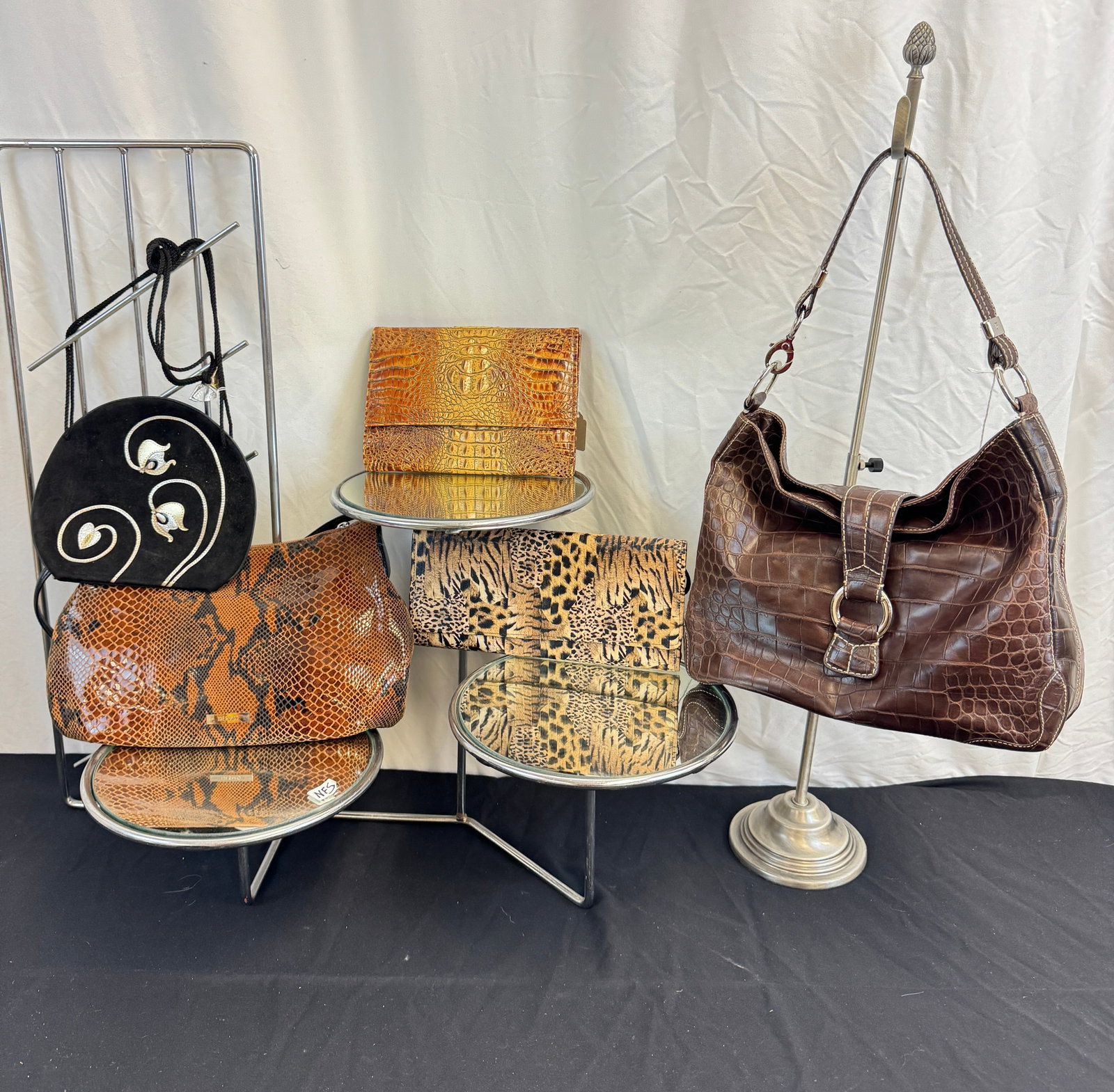 5 Vintage Fancy Leather Purses, Saks , More!: A group of 5 vintage leather handbags to include a Saks Fifth Avenue Italian leather stamped Alligator Clutch, an Italian Desmo printed snake shoulder bag, a Le Regal animal printed clutch/shoulder