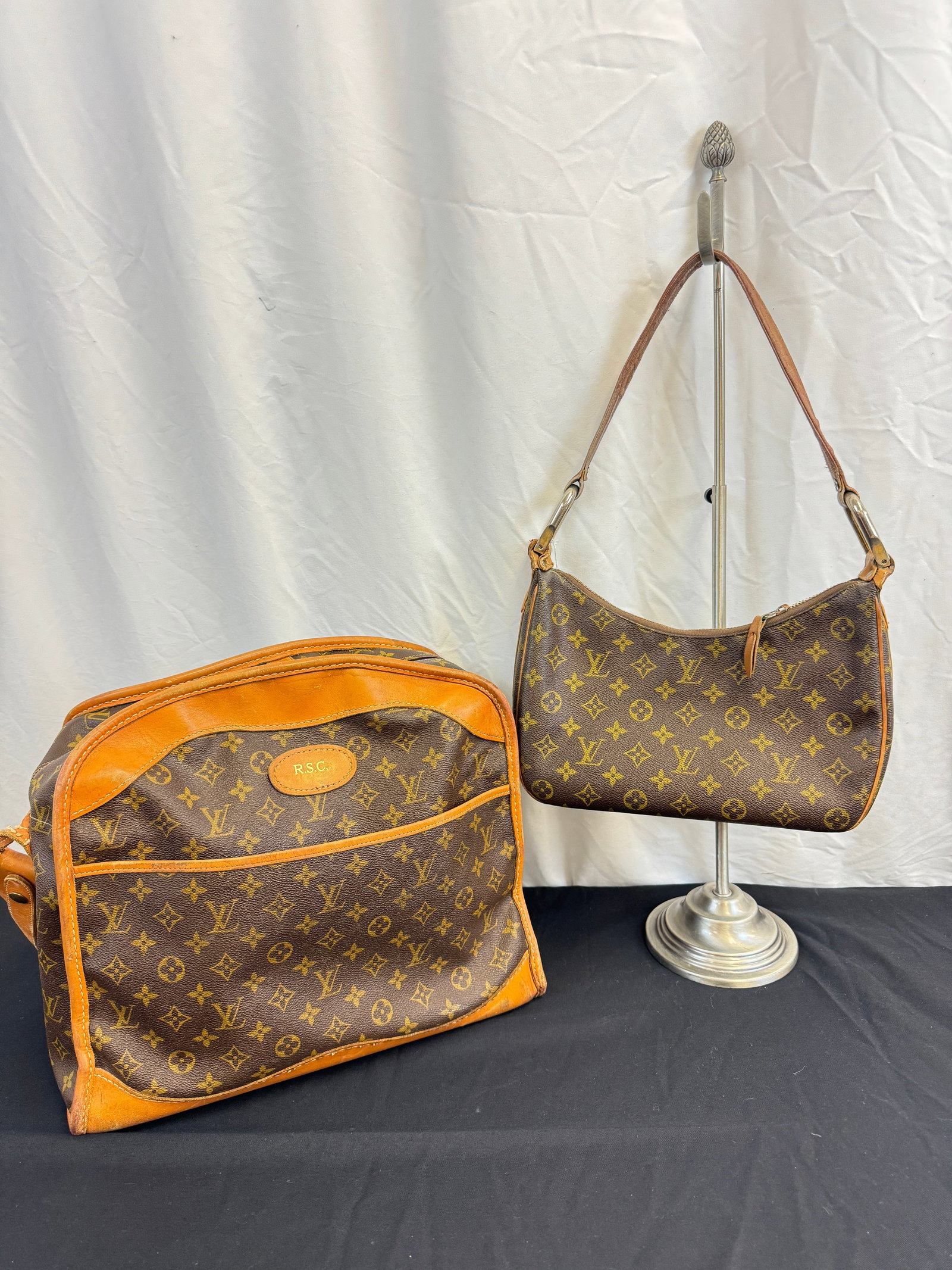 Louis Vuitton Vintage Monogram Tote Bag and Handbag: Two Louis Vuitton vintage monogram bags to include a Louis Vuitton by The French Company weekend travel tote bag in good condition, some wear noted to leather (12" tall X 15" across X 6" wide), and a 