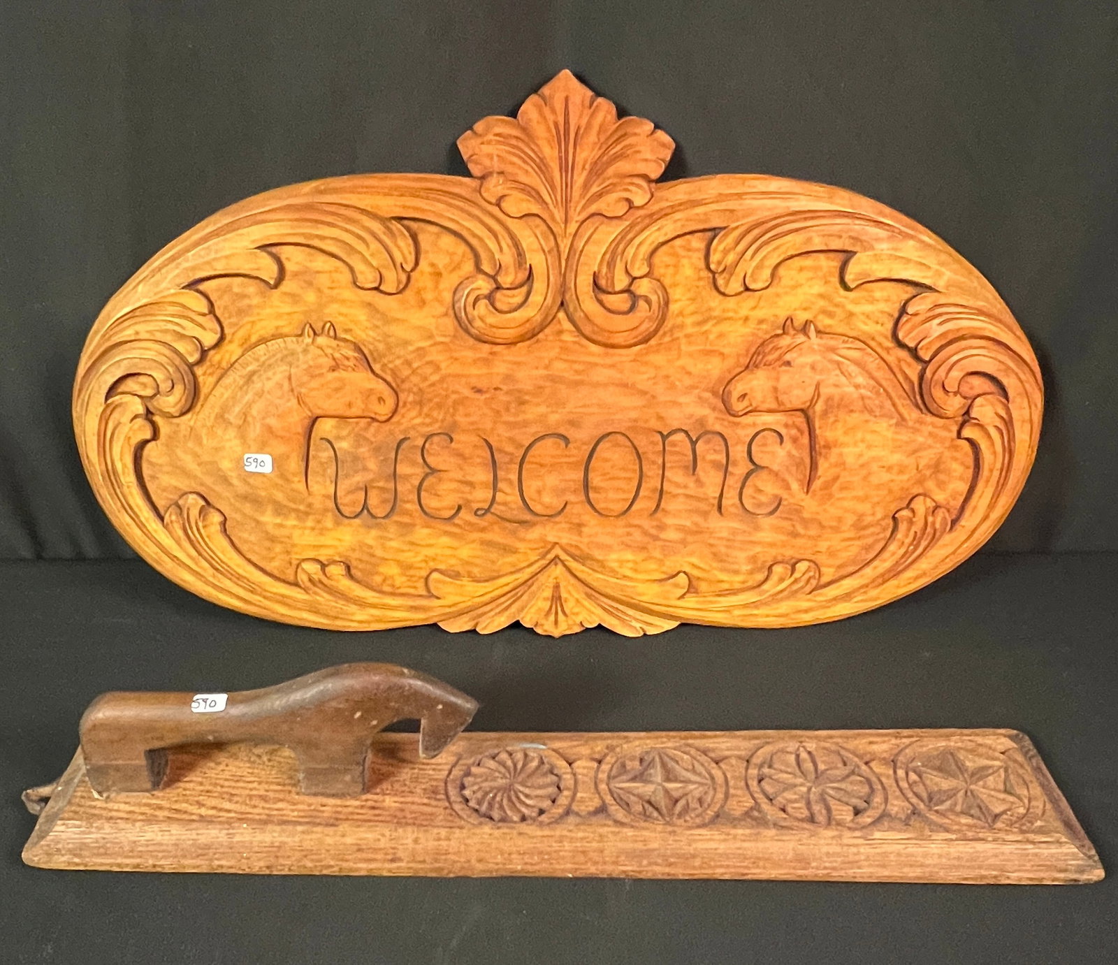 Norwegian Bed Smoother and Hand Carved Welcome Sign: An antique Norwegian bed smoother (25" long X 5" across) along with a fancy hand carved welcome plaque (28" long X 15" across. In excellent condition.