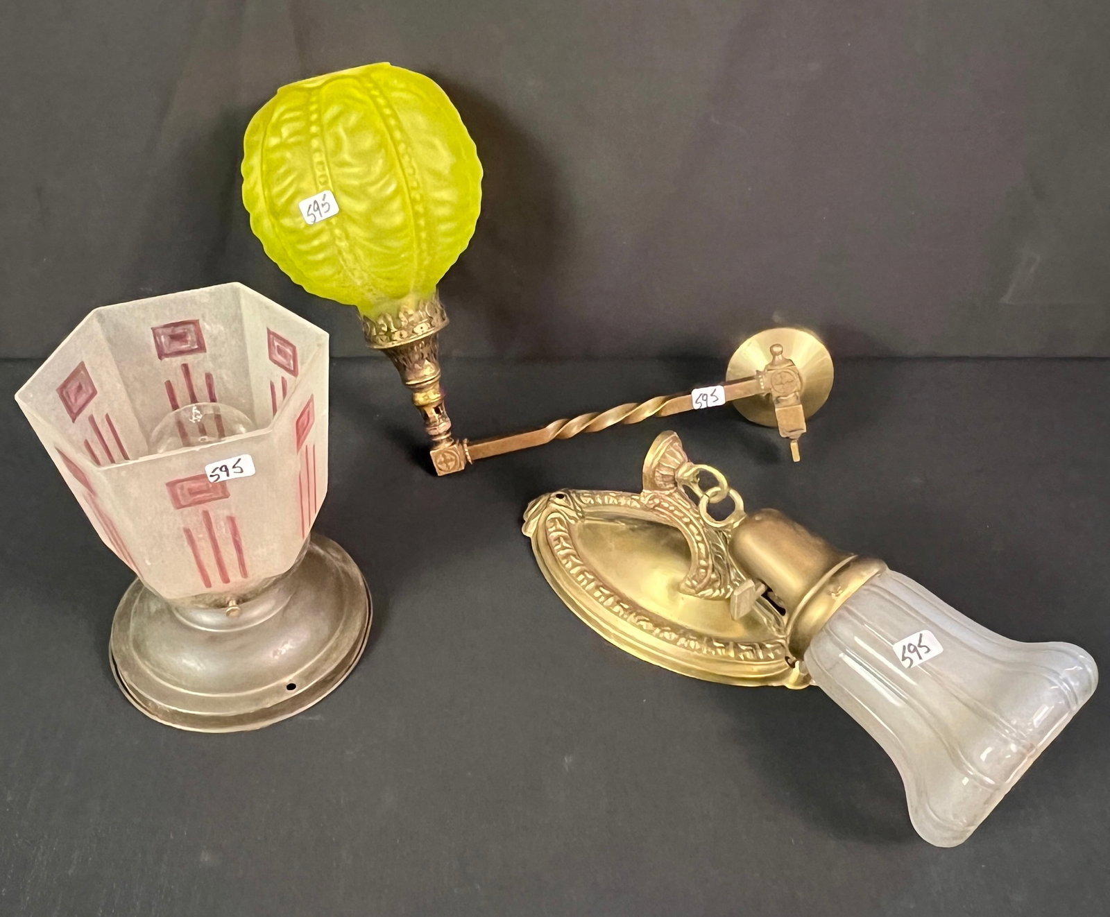Two Turn of the Century Wall Sconces and Ceiling Fixture: A fancy brass adjustable gas wall sconce with green ruffled shade (12" long), along with an Art Deco ceiling fixture and a turn of the century wall sconce. All in good condition.
