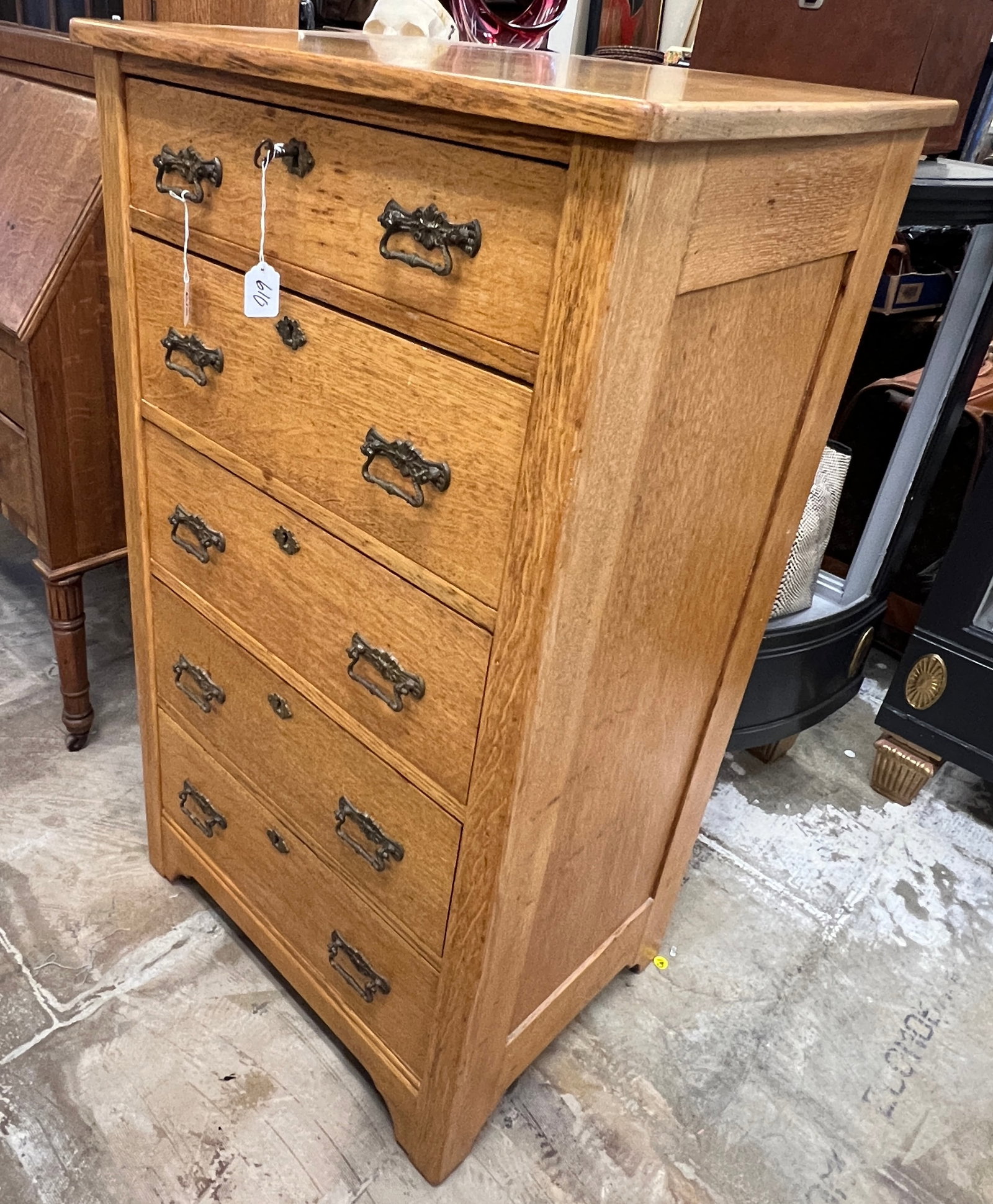 Oak Gentleman's Chest: A Victorian oak five-drawer gentlemen's chest with fancy hardware. In excellent, refinished condition it measures 43" tall X 25" across X 18" deep.