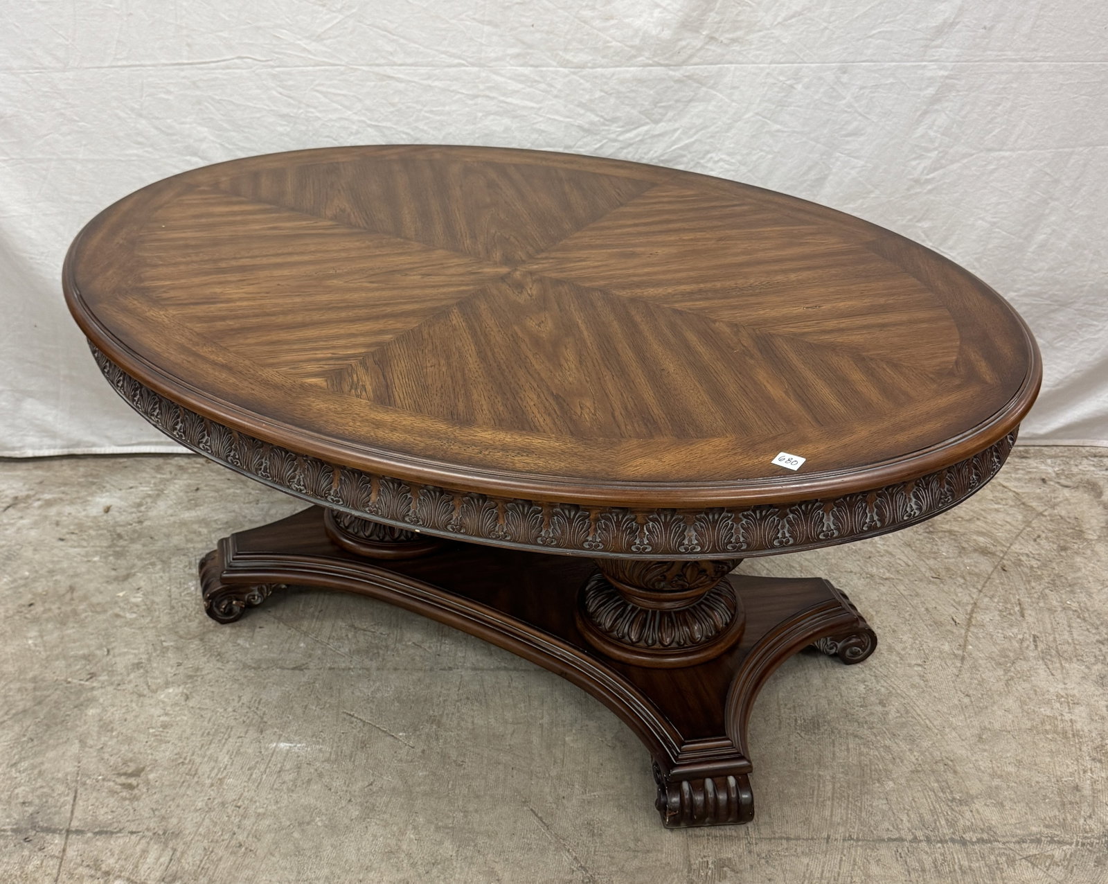 Quality Carved Double Pedastal Coffee Table: A quality contemporary double pedestal carved coffee table with a marquetry top in very good condition.