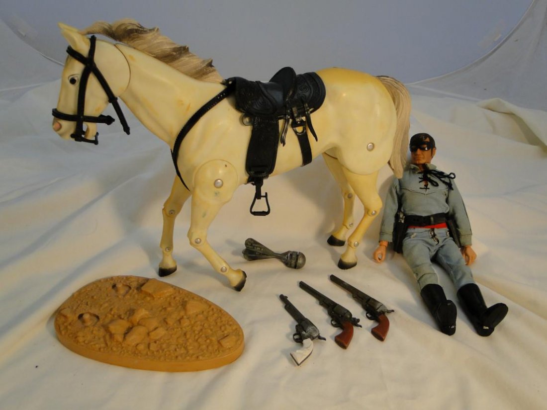 A Lone Ranger doll, his horse, along with miniature: A Lone Ranger doll, his horse, along with miniature guns and a cap popper