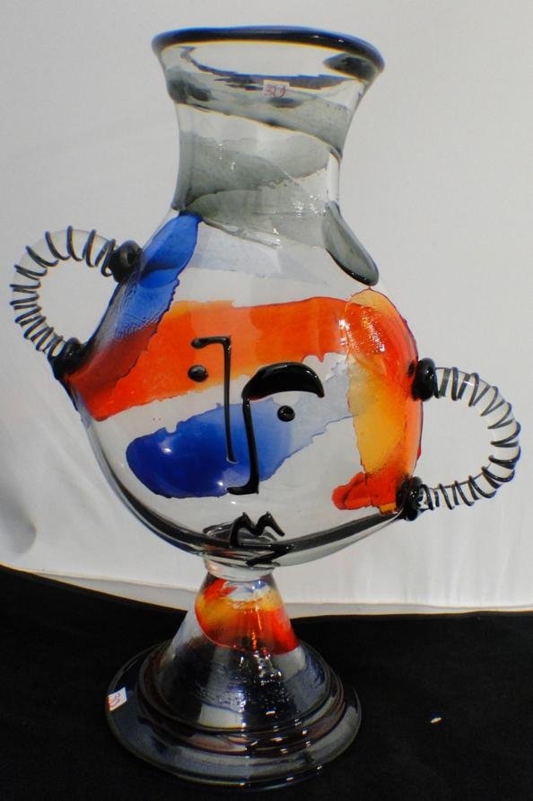 A Venetian Murano double handled face vase of important: A Venetian Murano double handled face vase of important size attributed to Mario Badiol, crack by handle noted. Measures 21" tall x 16" across