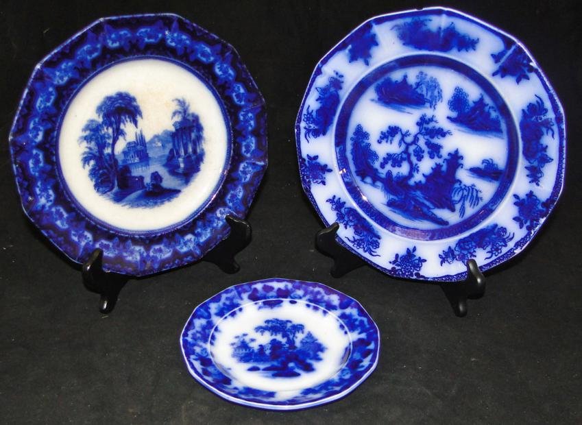 Three early Flow Blue plates, one by Excelsior, one: Three early Flow Blue plates, one by Excelsior, one Wedgewood Ironstone in the Chapoo pattern, and a small plate in the scinde pattern. Age chips noted to the two larger ones. Two larger ones measure