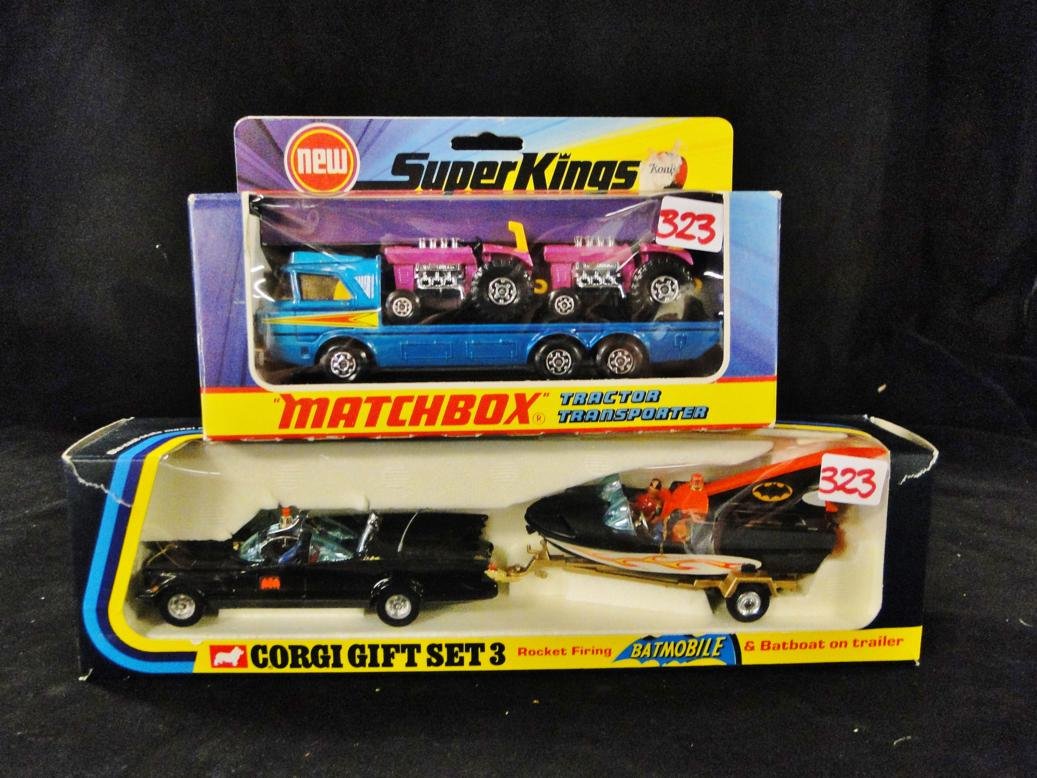 A rocket firing Corgi Batmobile with boat on trailer,: A rocket firing Corgi Batmobile with boat on trailer, along with a Matchbox Super Kings tractor transporter, all in original packaging