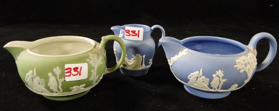 Three pieces of Wedgwood to include 2 creamers and 1: Three pieces of Wedgwood to include 2 creamers and 1 miniature pitcher