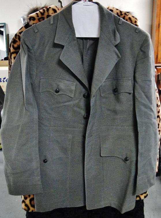 WWII uniforms to include 3 jackets, 2 shirts, and a: WWII uniforms to include 3 jackets, 2 shirts, and a pair of pants