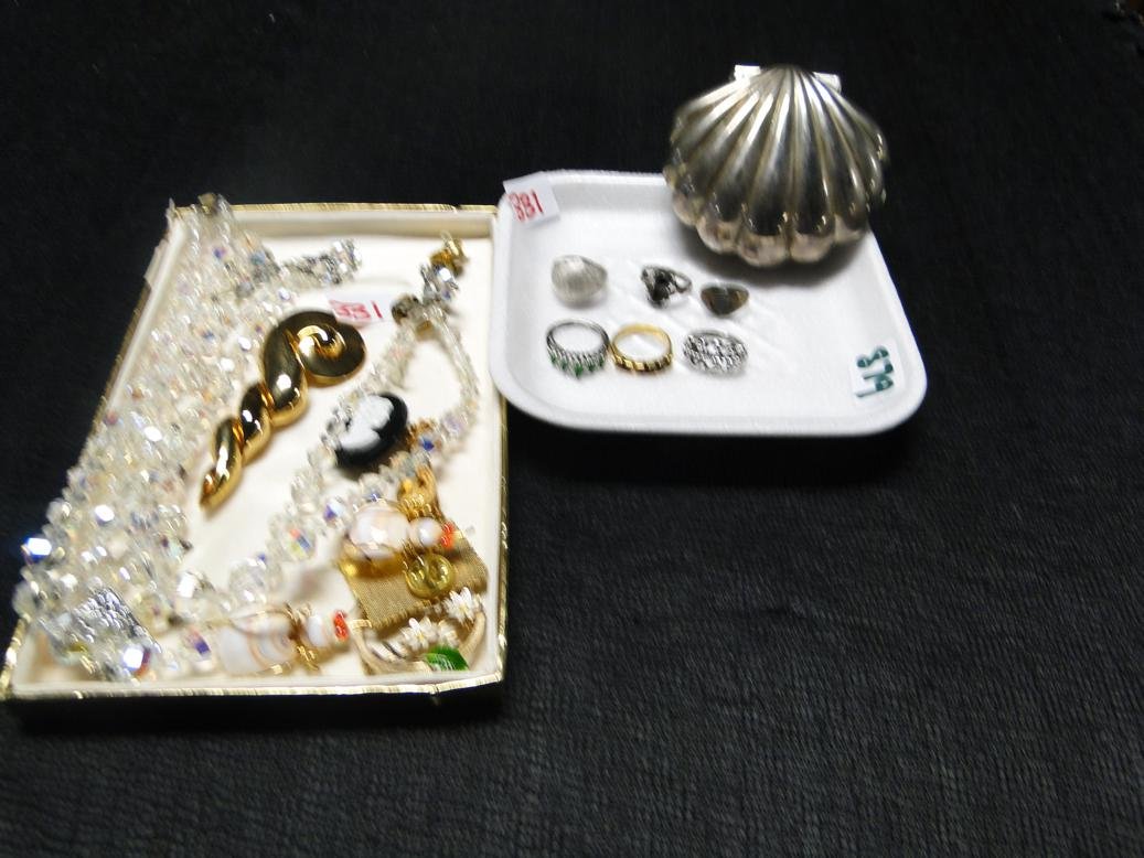 Eight tray lot to include crystal jewelry to include: Eight tray lot to include crystal jewelry to include clamshell ring holder and assorted rings