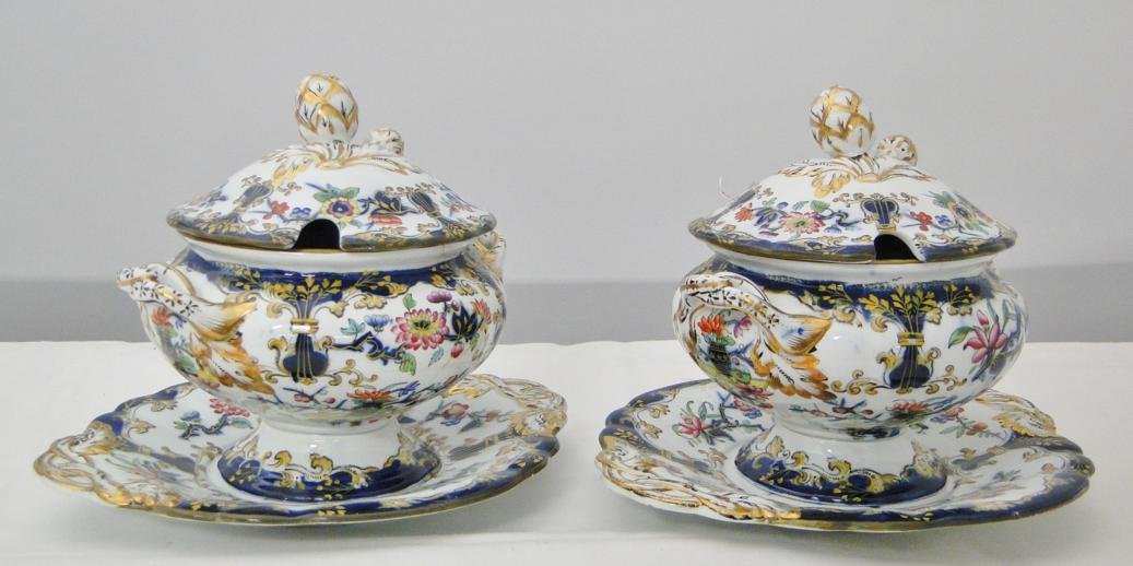 A pair of antique English ironstone, Minton and Hollins: A pair of antique English ironstone, Minton and Hollins Mintons B B New Stone, Japanese covered sauce servers with underplates. The underplates measure 9" across by 8" up and down. The sauce server wi