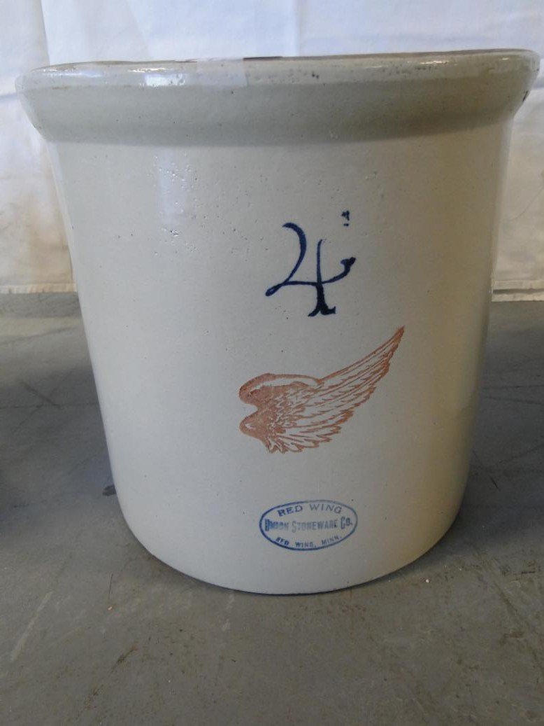 a signed 4 gallon Red Wing crock in good condition. It: a signed 4 gallon Red Wing crock in good condition. It measures 12" tall by 11 1/2" across