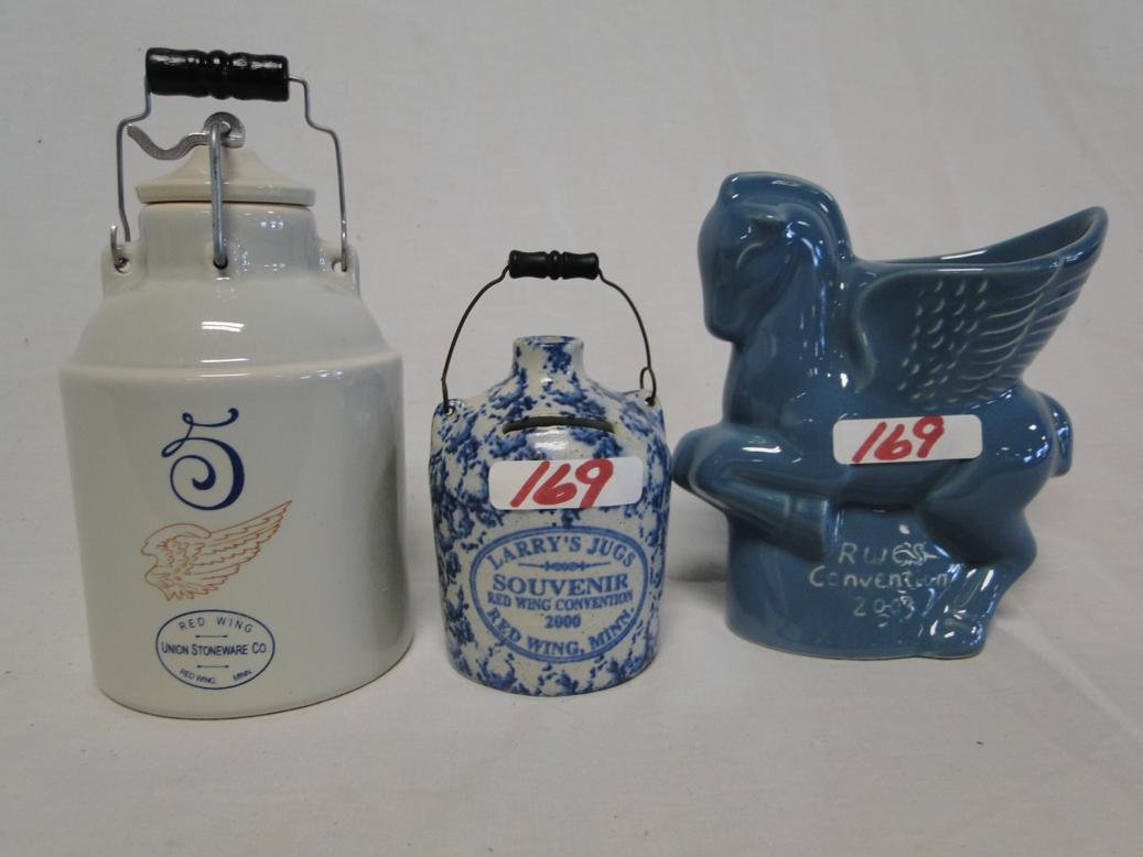 Three Red Wing commemorative pieces to include covered: Three Red Wing commemorative pieces to include covered stoneware 25th anniversarey storage jar, 2000 jug, and 2003 horse vase.