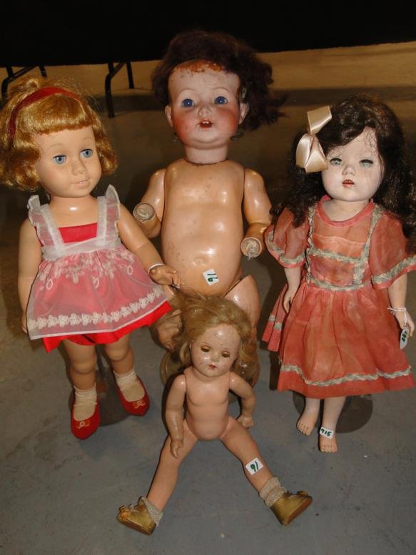 A Chatty Cathy doll in original clothes along with one: A Chatty Cathy doll in original clothes along with one other doll, a Victorian bisque-head baby doll with composition body in poor condition and two other dolls. The Chatty Cathy stands 20 1/2" tall.