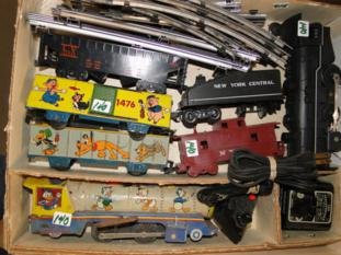 A Lewis Marx Donald Duck circus train along with: A Lewis Marx Donald Duck circus train along with another and miscellaneous in a box.