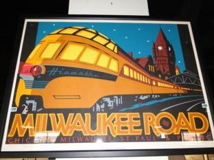 Artist signed John T. McCarthy Jr. railroad print: Artist signed John T. McCarthy Jr. railroad print artist proof entitled, "Hiawatha The Milwaukee Road", quality framed and matted.