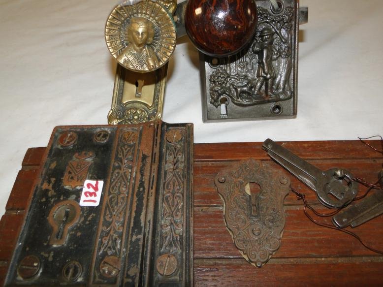 Fancy Victorian hardware to include a brass doorknob: Fancy Victorian hardware to include a brass doorknob and plates with 3 dimensional oriental girl with umbrella, a Bennington lock set with 3 dimensional hunter with dog, and one other.
