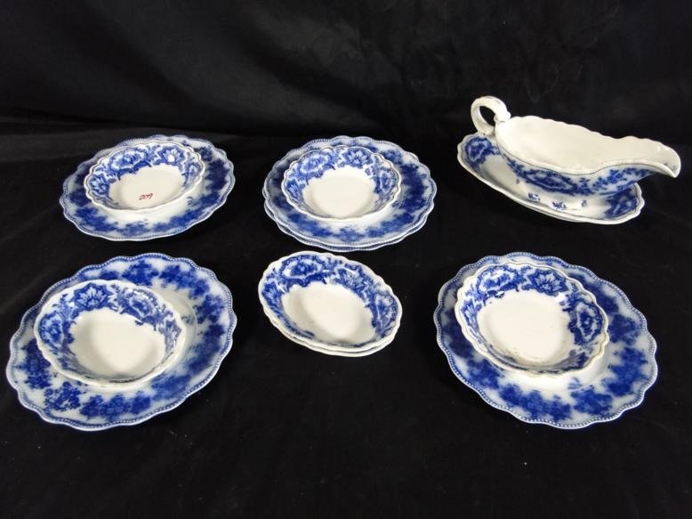 A large group of flow blue to include 5 luncheon plates: A large group of flow blue to include 5 luncheon plates singed but indistinguishable along with an assortment in Alaska pattern by Crindley, England of a gravy boat, relish dish, 3 oval sauce bowls an