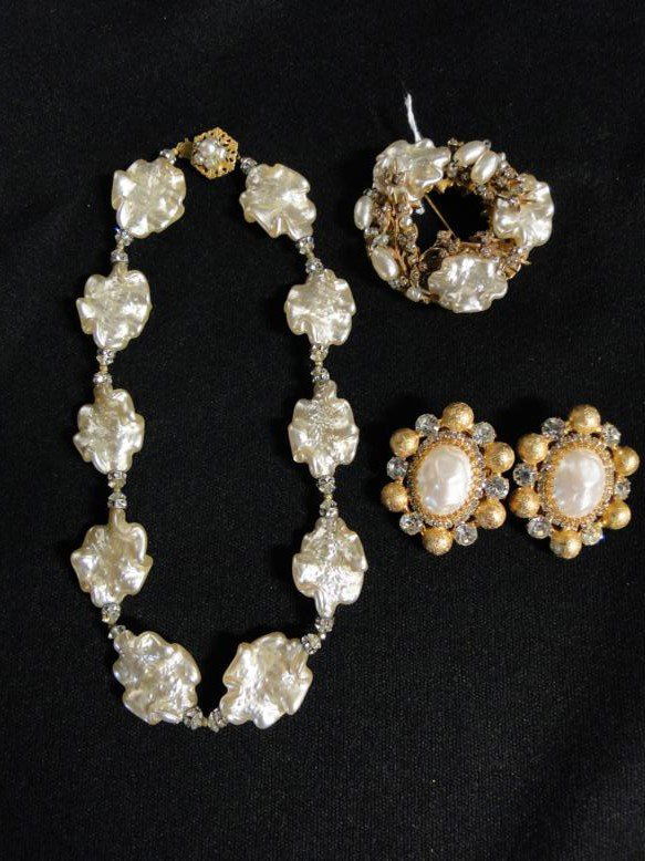 A signed Miriam Haskell necklace with simulated pearls: A signed Miriam Haskell necklace with simulated pearls along with a matching signed rhinestone and simulated pearl brooch, and a pair of earrings by Bill Smith of Richelieu