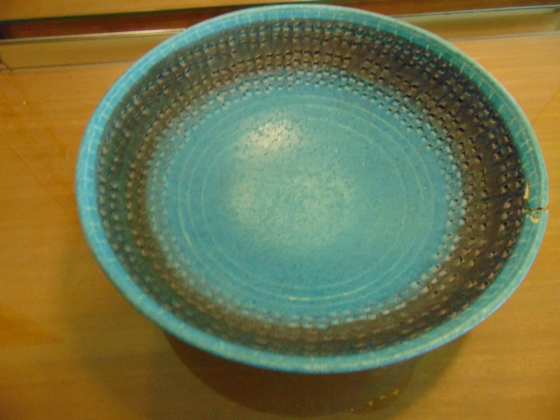 Raymor center bowl with paper label by Bagni. Repair to: Raymor center bowl with paper label by Bagni. Repair to edge noted.